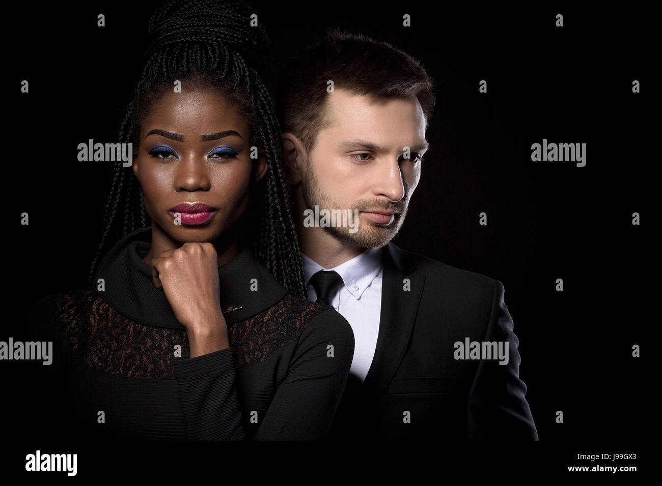 Close up portrait of multi ethnic man and woman. Stock Photo