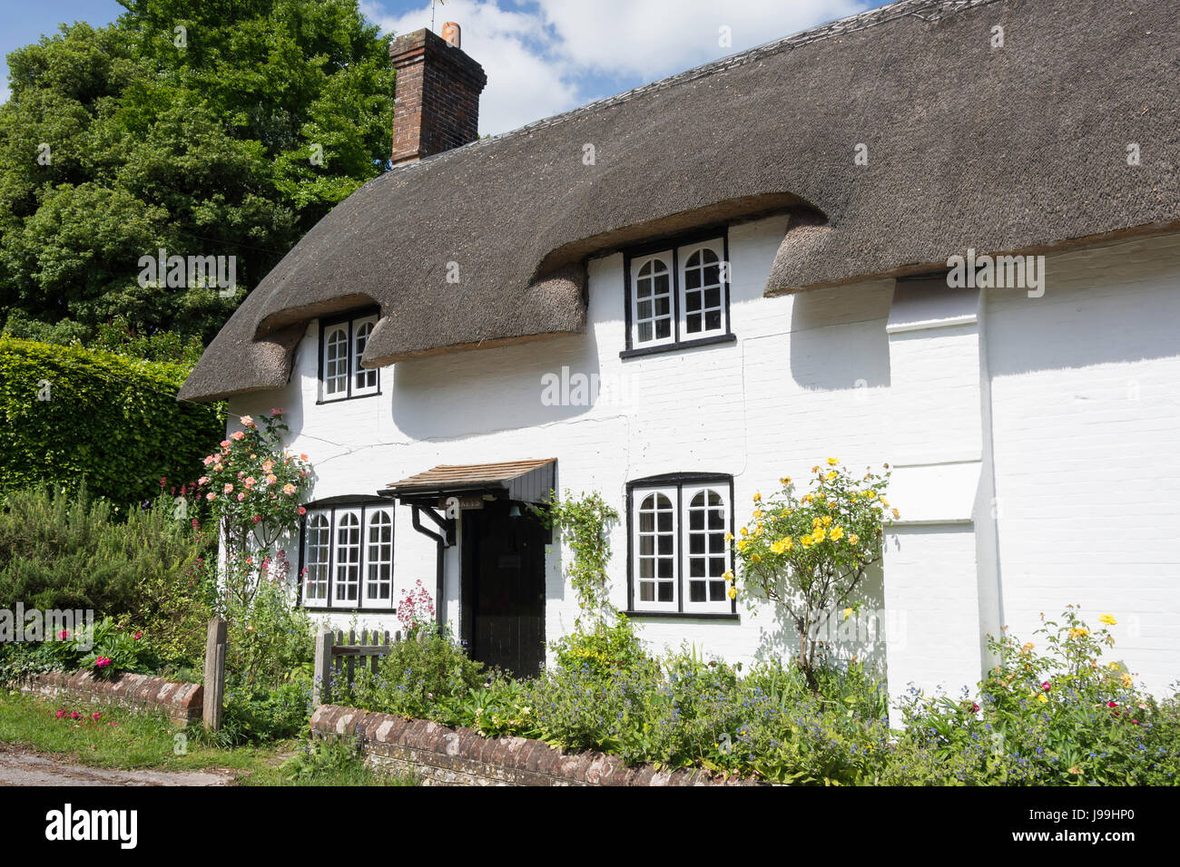 Thatched cottage, Church Lane, West Meon, Hampshire, England, United Kingdom Stock Photo