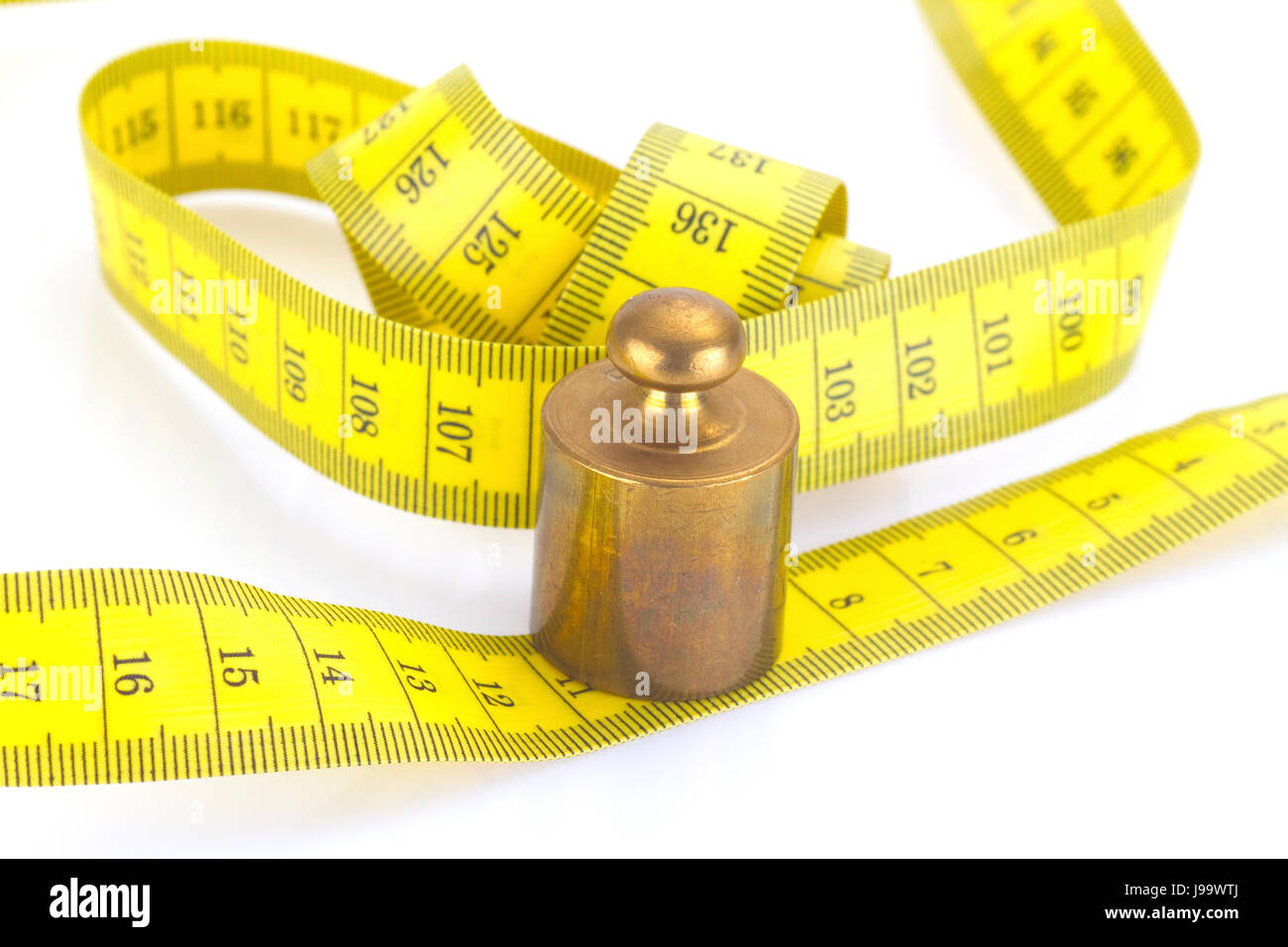 Measuring tape with brass weight in detail Stock Photo Alamy