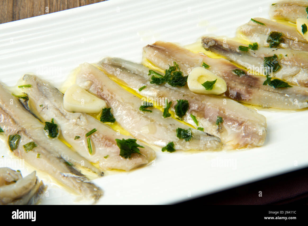 salt, wood, angle, fish, olive oil, vinegar, sardines, herring, recipe Stock Photo Alamy