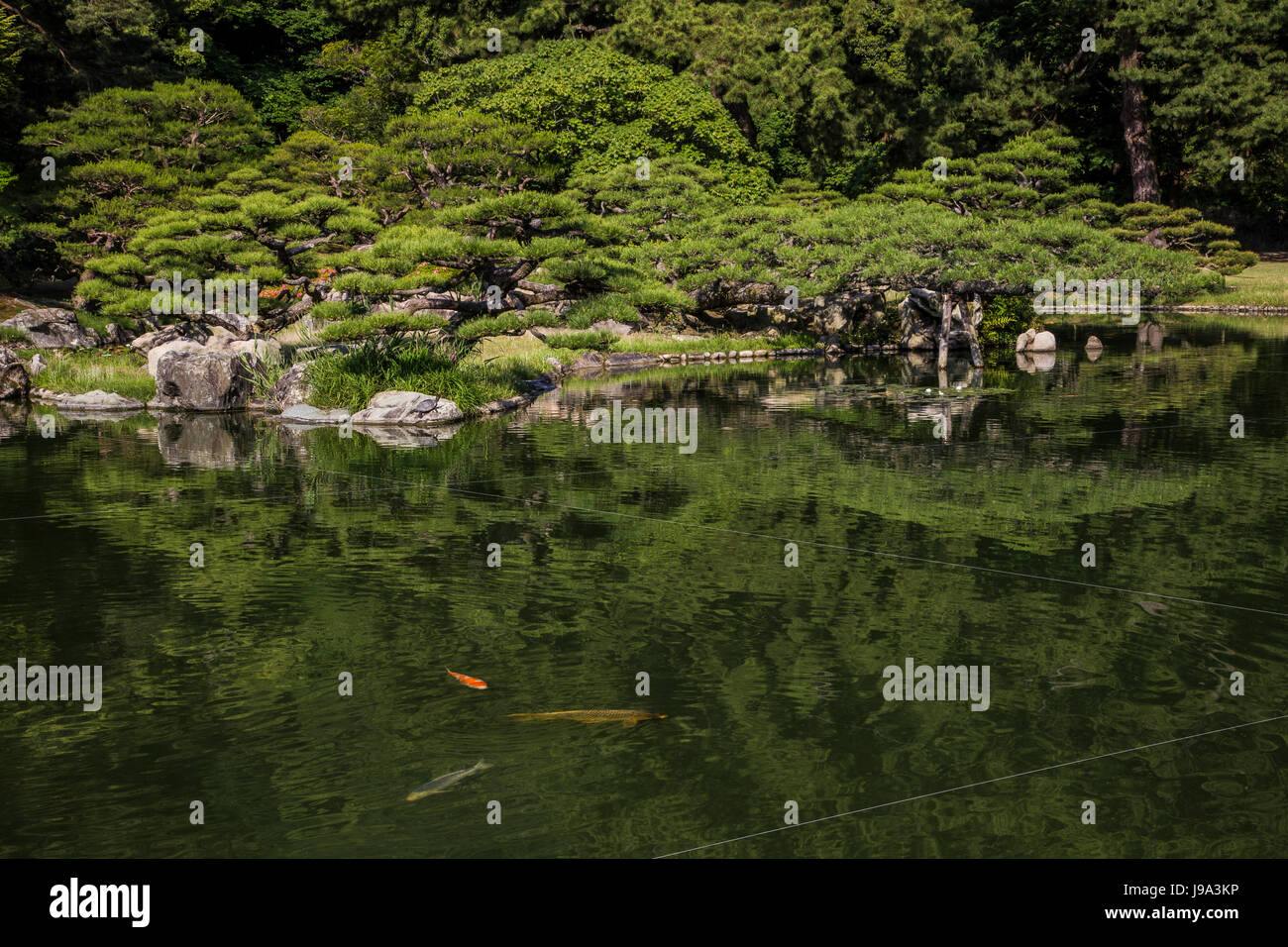 Ritsurin Pond Garden - Ritsurin Garden is a landscape garden in Takamatsu  built by the local feudal lords during the Edo Period. Considered one of th Stock Photo