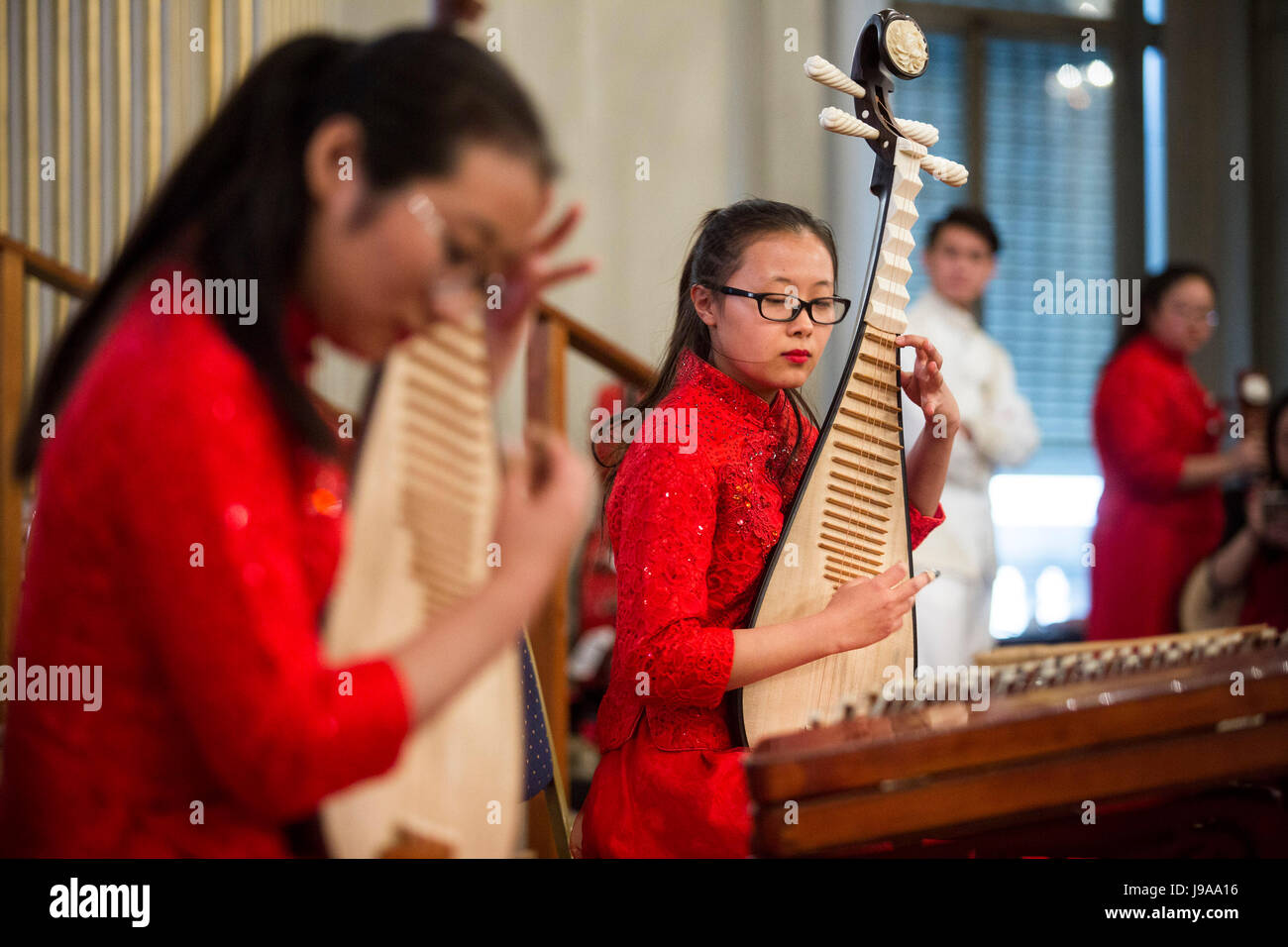 Buenos Aires, Argentina. 30th May, 2017. Members of the Juvenile Orchestra of the Shanghai Theatre Academy perform at the Palace of the Buenos Aires City Legislature in Buenos Aires, capital of Argentina, on May 30, 2017. The Juvenile Orchestra of the Shanghai Theatre Academy shined on Tuesday during a concert in Buenos Aires, which was held to mark the 45th anniversary of the establishment of diplomatic ties between China and Argentina. Credit: Martin Zabala/Xinhua/Alamy Live News Stock Photo