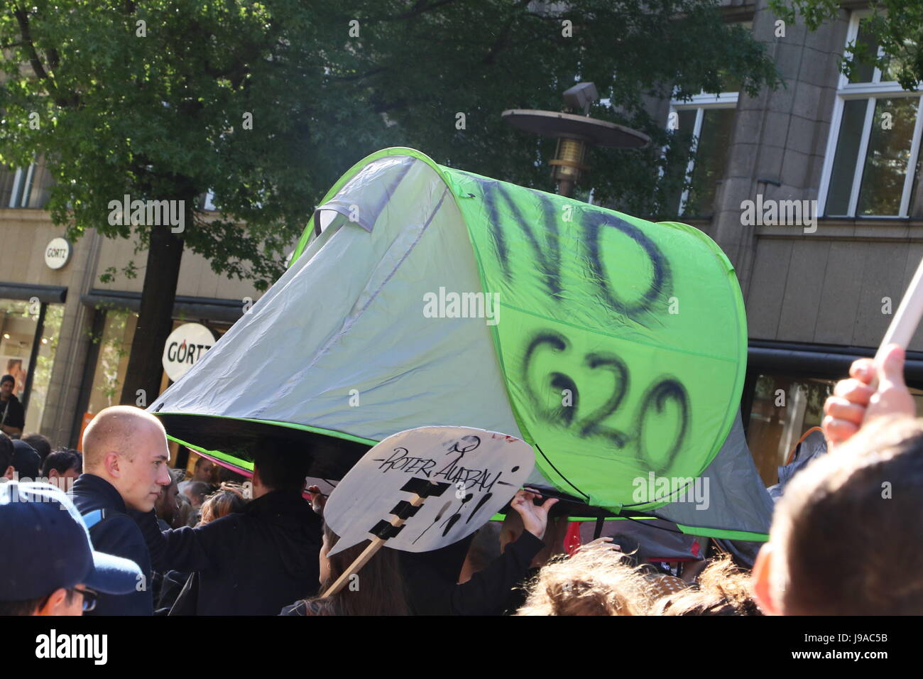 Hamburg, Germany, 31st May, 2017. Protesters carrying a tent with the inscription 'no G20' during a demonstration against the G20 summit held at Moenckebergstrasse, Hamburg, Germany, 31.05.2017. Credit: Christopher Tamcke/AlamyLiveNews Stock Photo