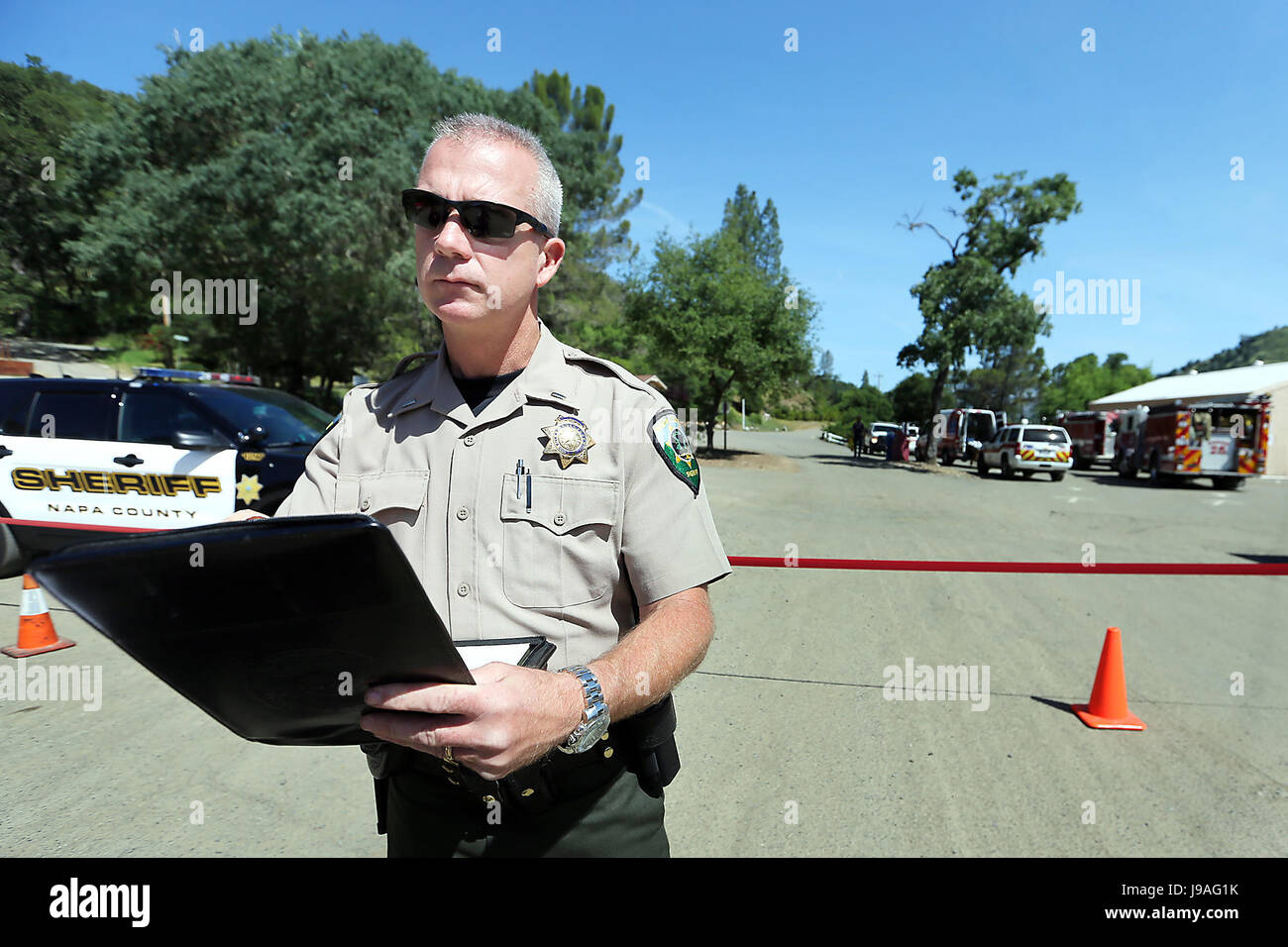 Lake Berryessa, CA, USA. 8th May, 2017. Lt. Chris Carlisle of the Napa County Sheriff's Department speaks to the media at Pleasure Cove Marina on Monday with details of a plane crash at Lake Berryessa. The crash occurred near Pleasure Cove Marina and Markley Cove Resort in an area of the lake that could only be reached by boat. Credit: Napa Valley Register/ZUMA Wire/Alamy Live News Stock Photo