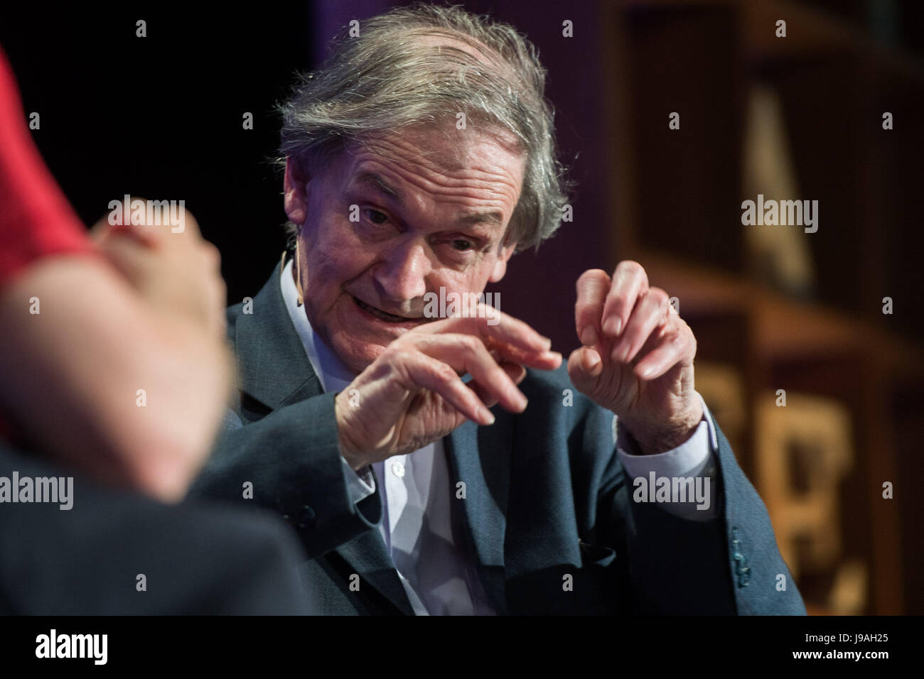 Hay Festival, Wales UK, Thursday 01 June 2017  Eminent theoretical physicist ROGER ENROSE talking animatedly about 'string theory' on stage   on the 8th day of the 2017 Hay Festival, in the small Welsh town of Hay on Wye in rural Powys.  Now in its 30th year, the literature festival draws some of the best writers , academics and commentators from across the globe, and  tens of thousand of visitors a day to what was described by former US president Bill Clinton as 'the woodstock of the mind'    Photo credit © Keith Morris / Alamy Live News Stock Photo