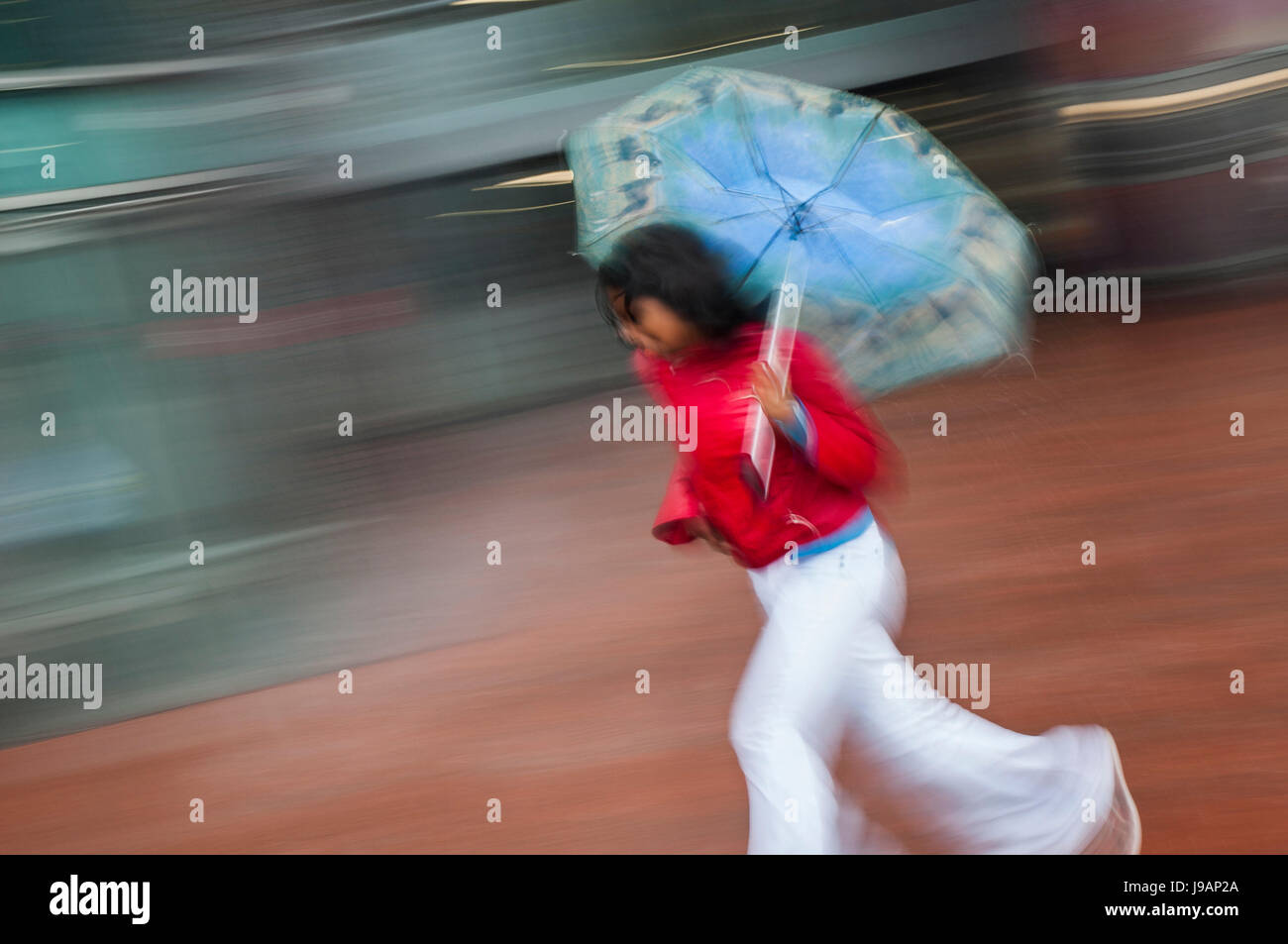 walk, go, going, walking, umbrella, rain, girl, girls, wind, water, raining, Stock Photo
