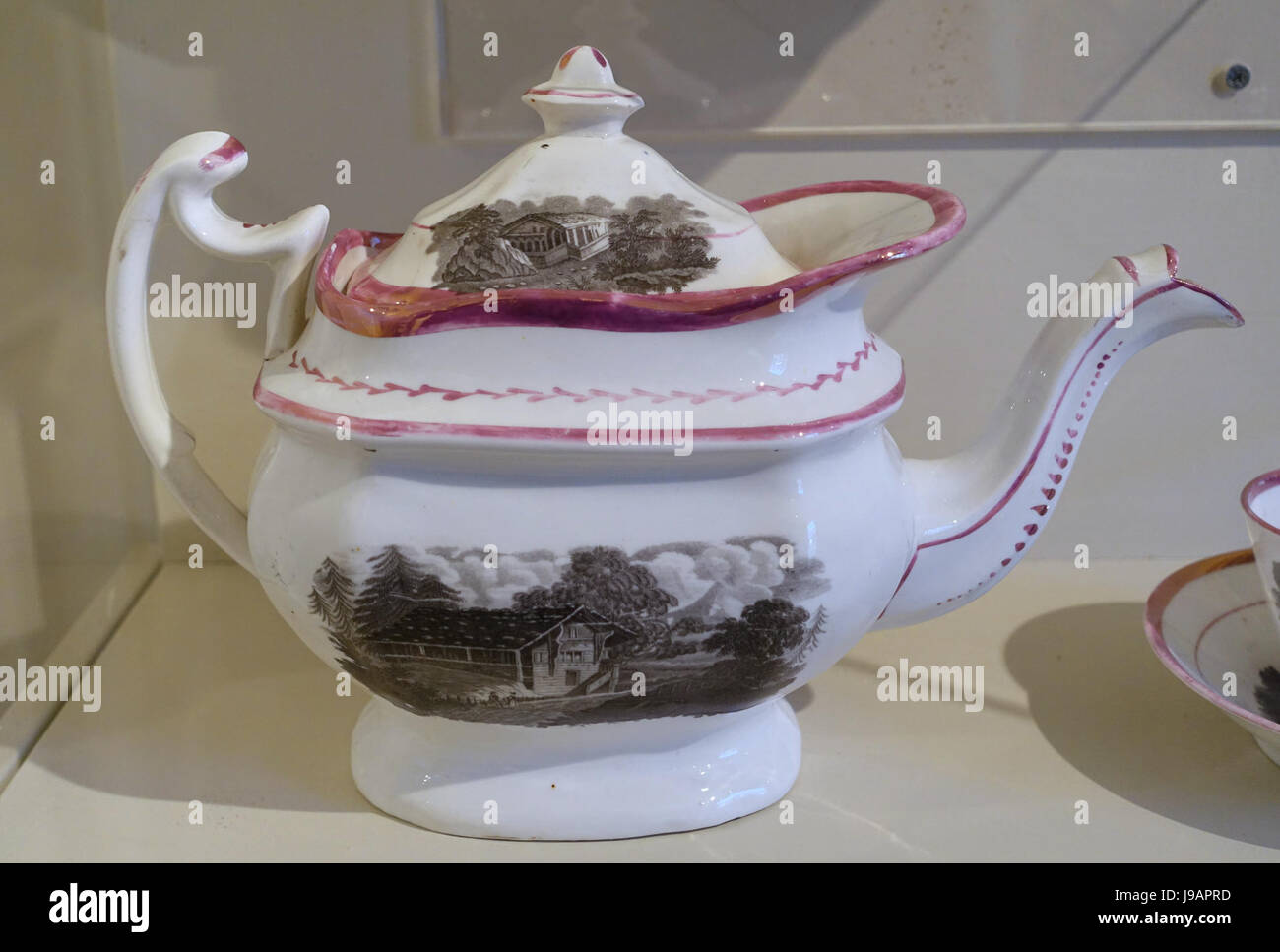 Teapot, England, mid to late 1800s, earthenware with pink luster glaze