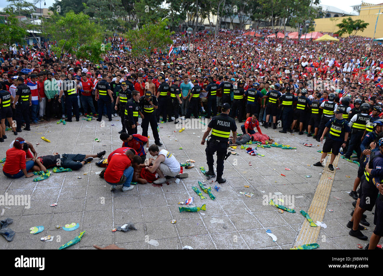 Emergency responders attend to three stabbing victims who were assaulted while watching in San José's Plaza de la Democracía as the Costa Rica nationa Stock Photo