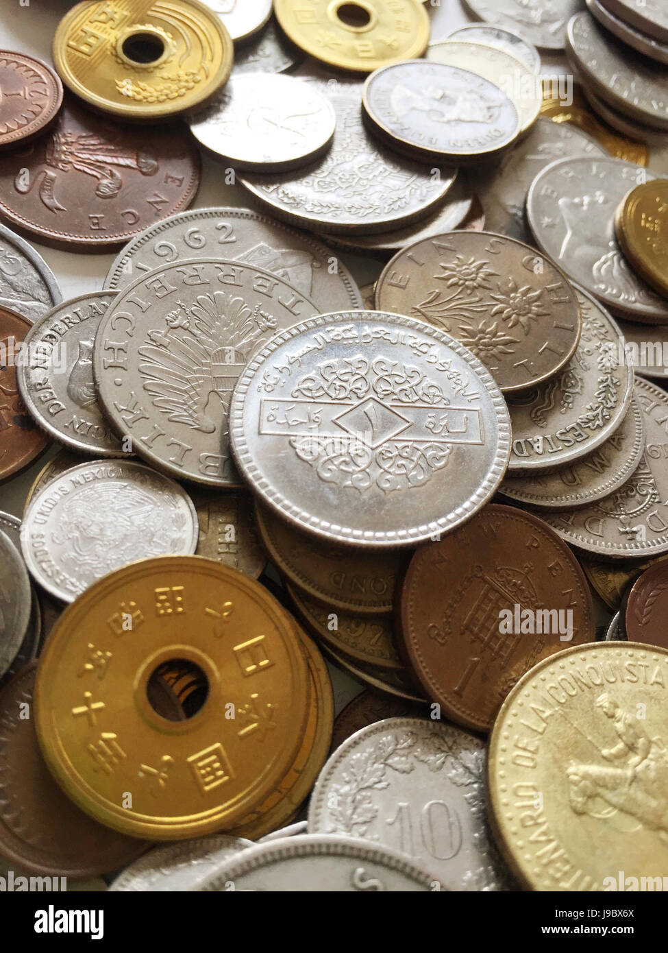 Multiple International Coins Stock Photo