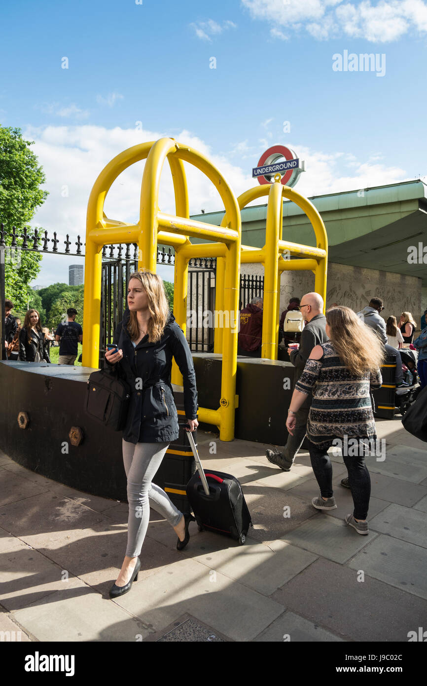 Yellow security barriers erected around Green Park in the wake of terrorist activity in the UK Stock Photo