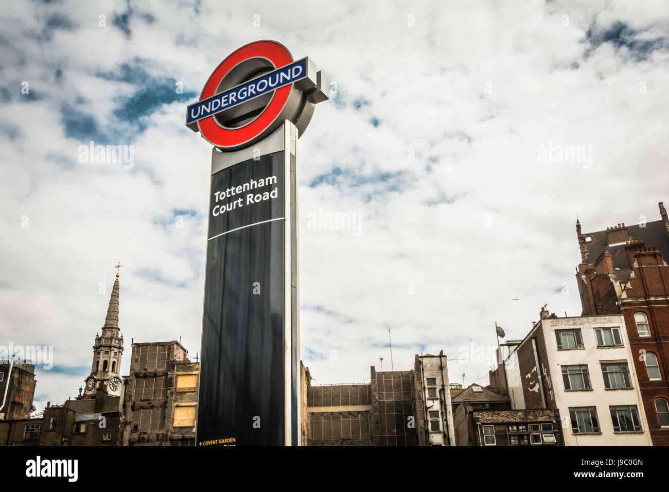 Tottenham Court Road tube station roundel at St Giles, Camden, London ...
