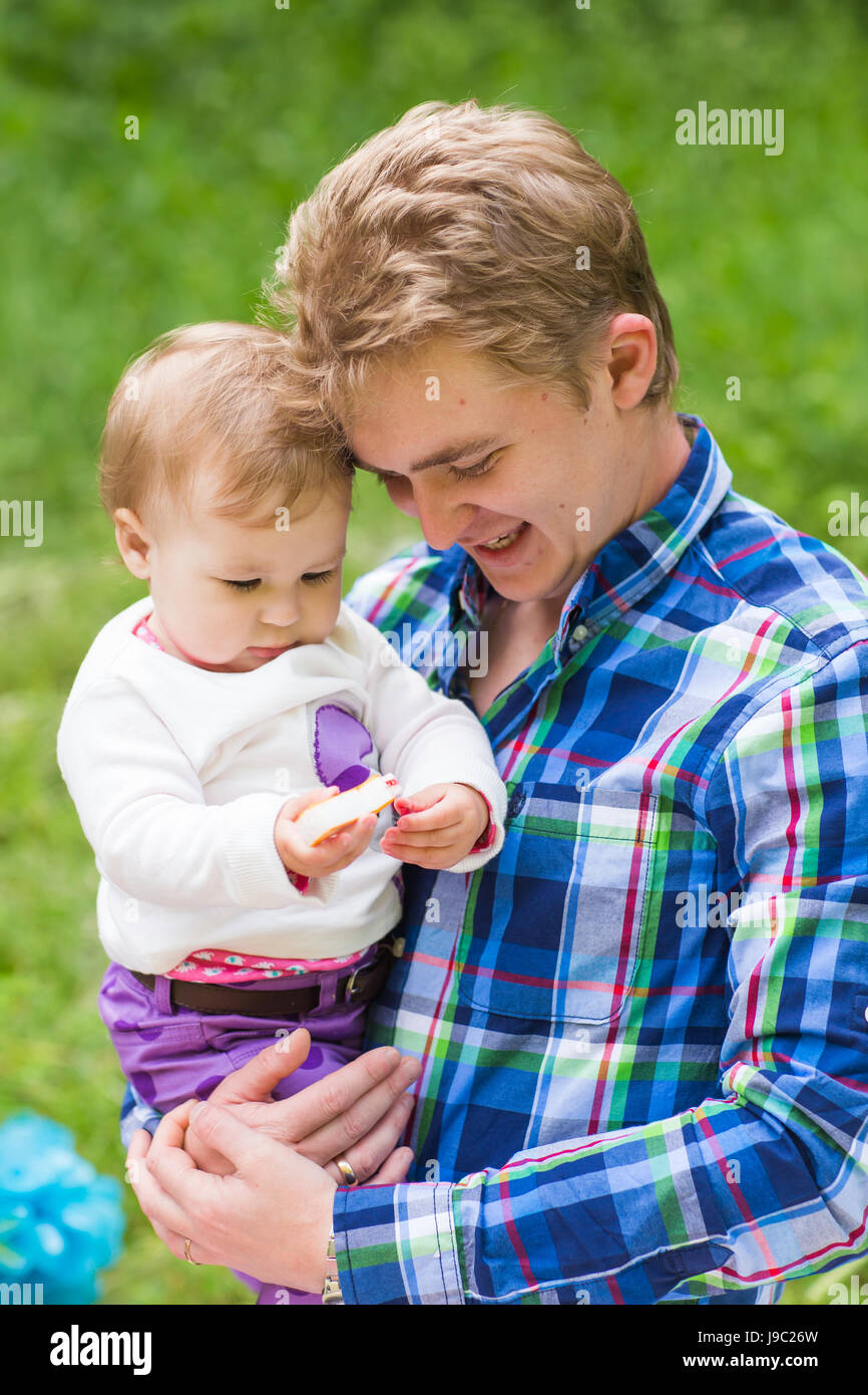 Portrait of happy father with daughter in summer park Stock Photo - Alamy