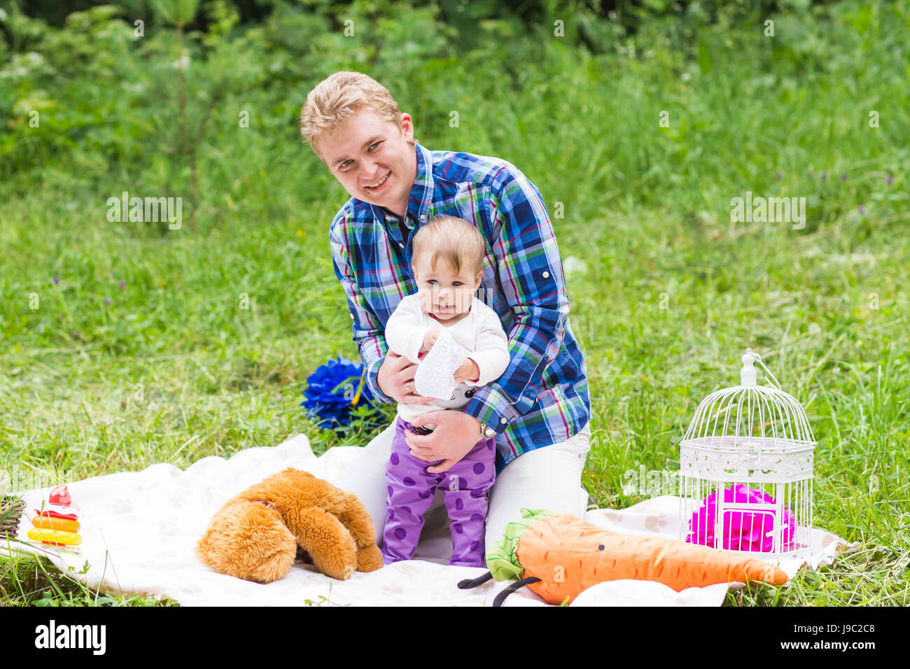 Happy father with baby daughter in summer park Stock Photo - Alamy