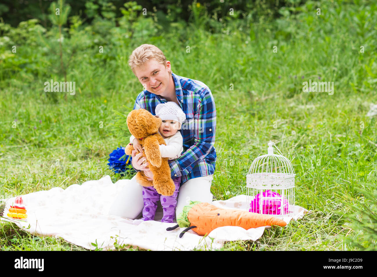 Happy father with baby daughter in summer park Stock Photo - Alamy
