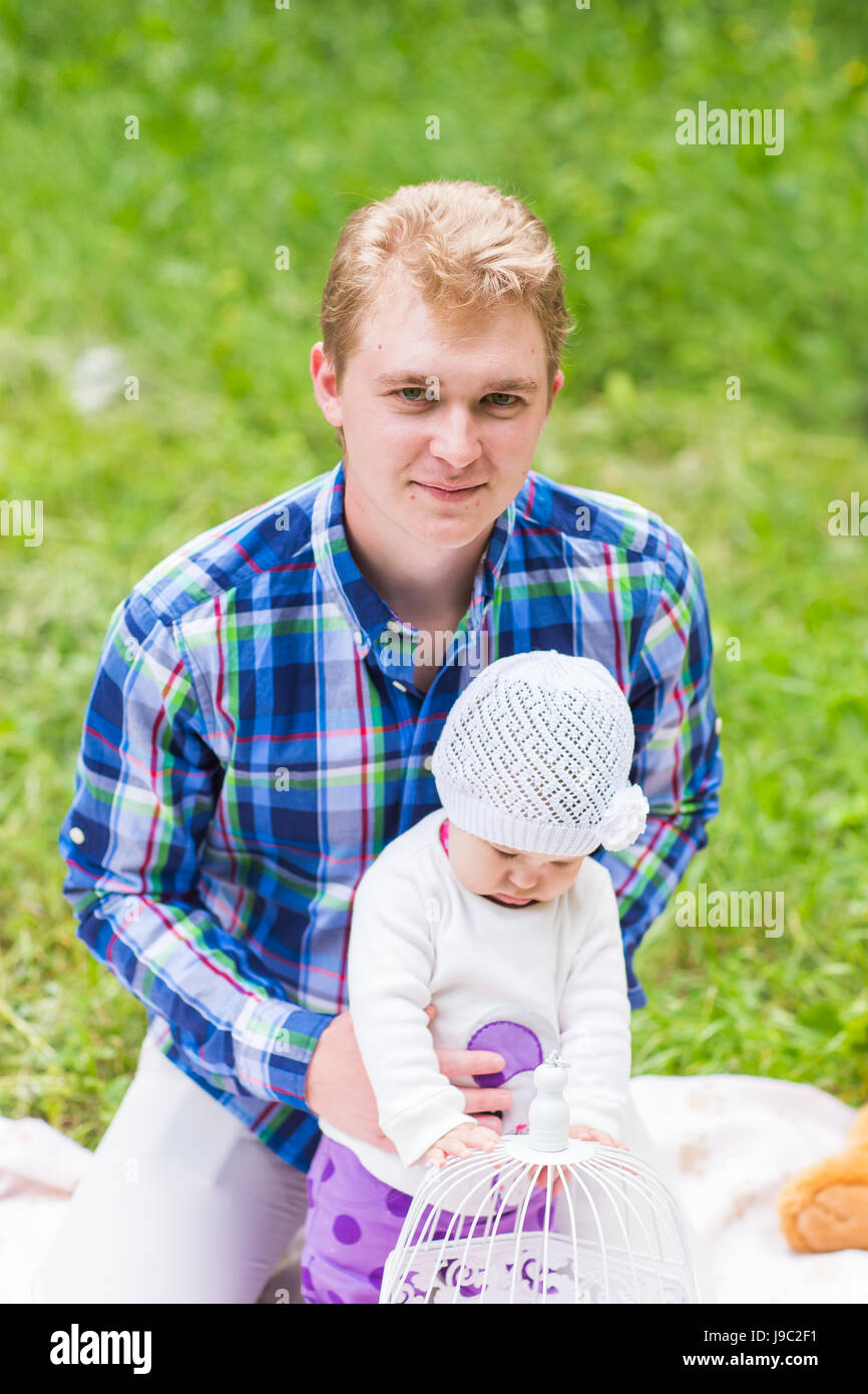 Happy father with baby daughter in summer park Stock Photo - Alamy