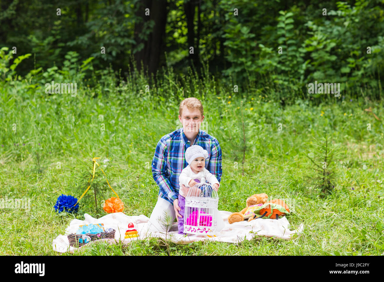 Happy father with baby daughter in summer park Stock Photo - Alamy