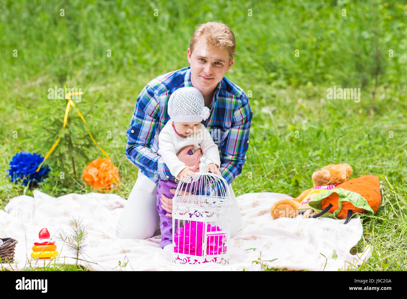 Happy father with baby daughter in summer park Stock Photo - Alamy