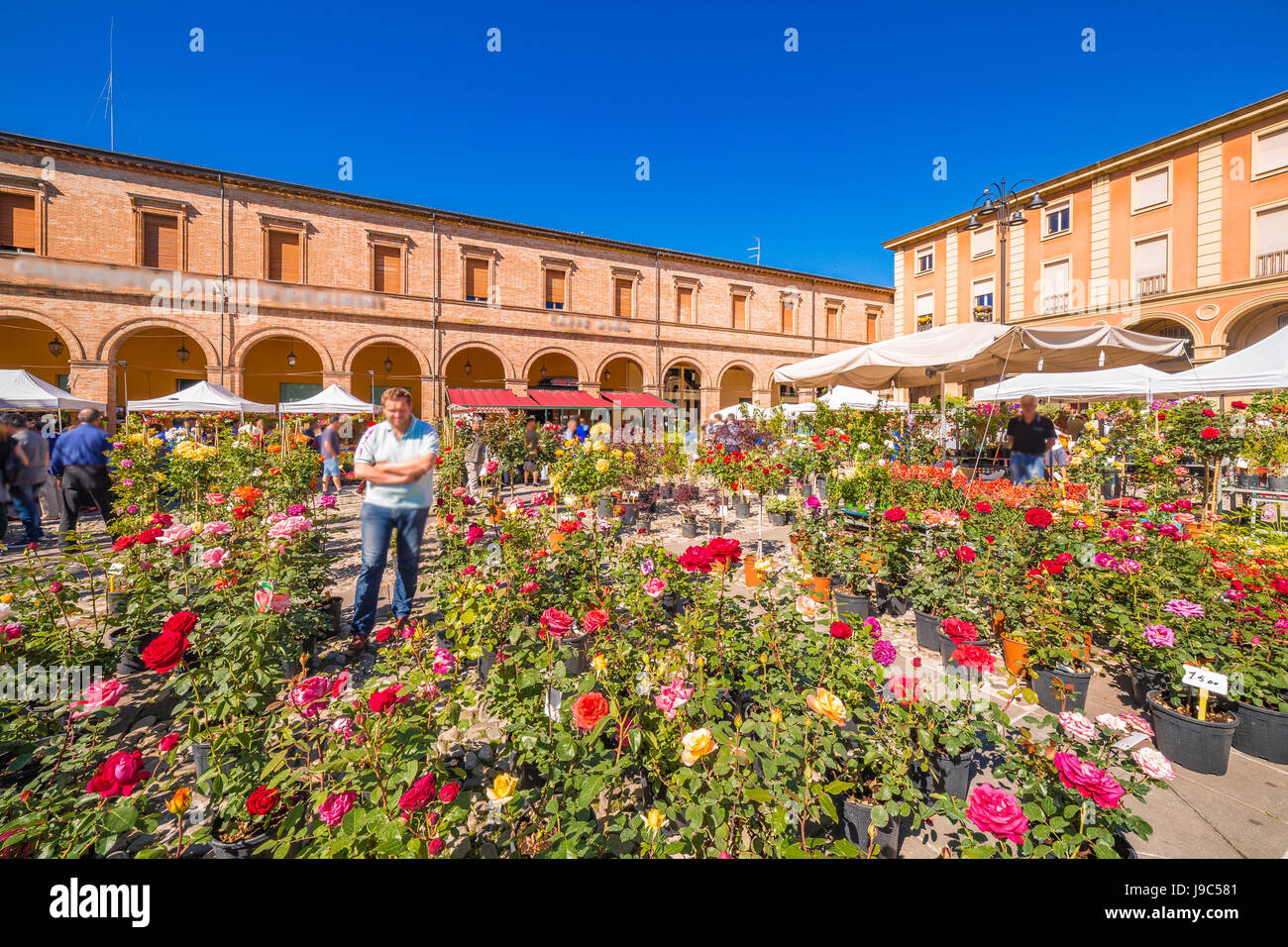 Flower fair in medieval village in Italy Stock Photo - Alamy