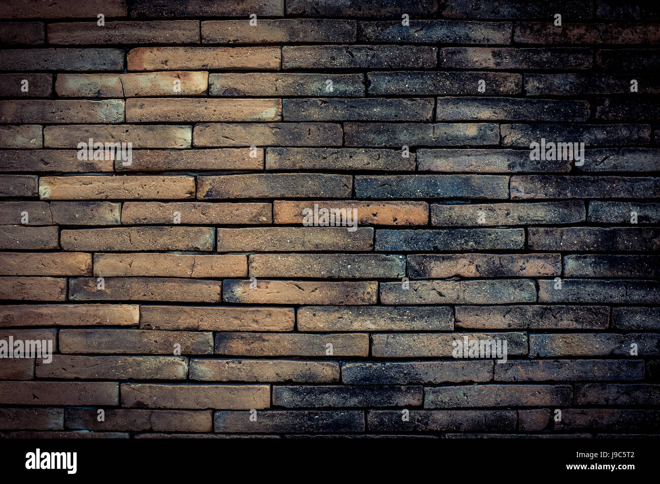Old brick wall texture in a background image Stock Photo - Alamy