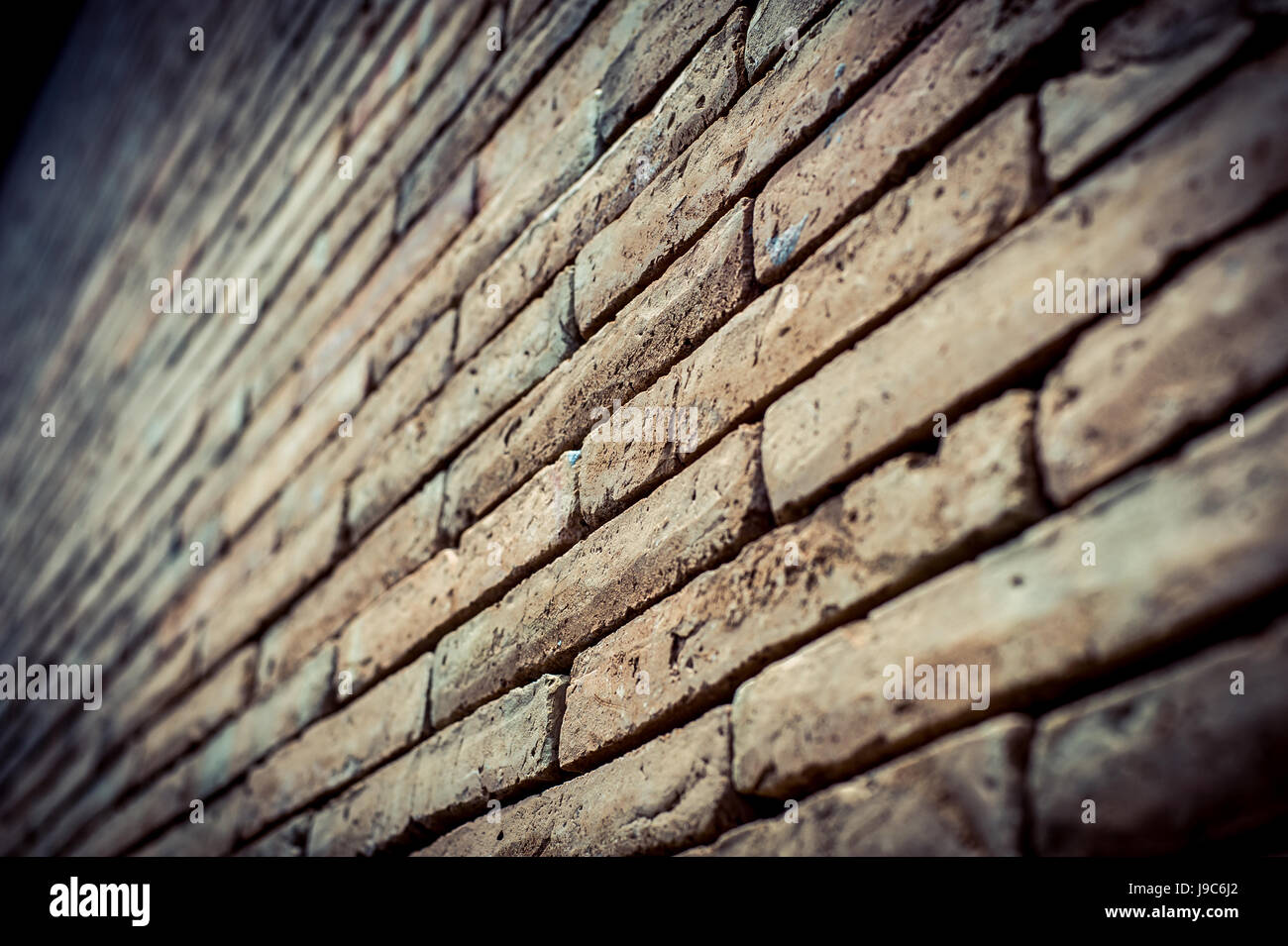 Old brick wall texture in a background image Stock Photo - Alamy