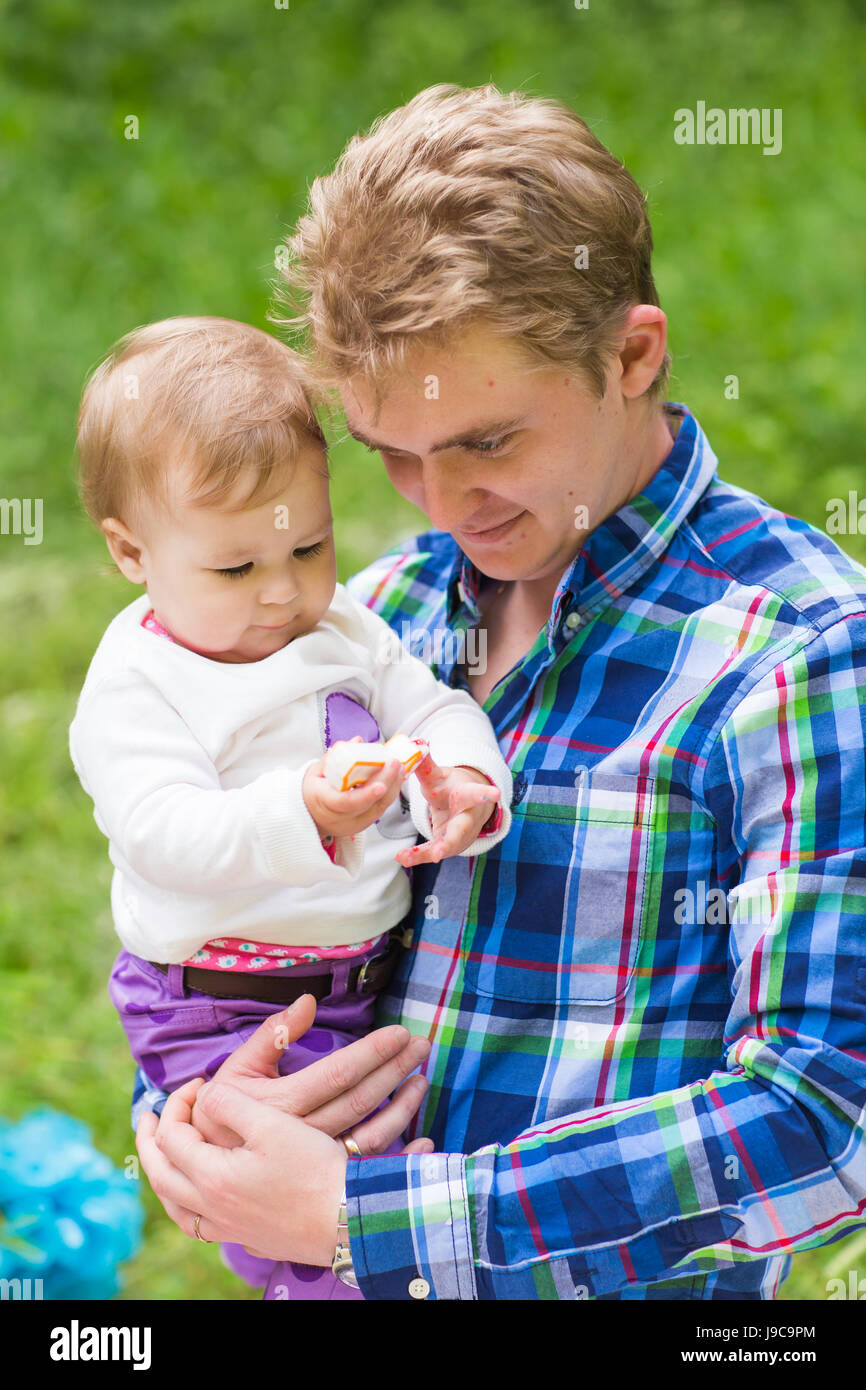 Portrait of happy father with daughter in summer park Stock Photo - Alamy