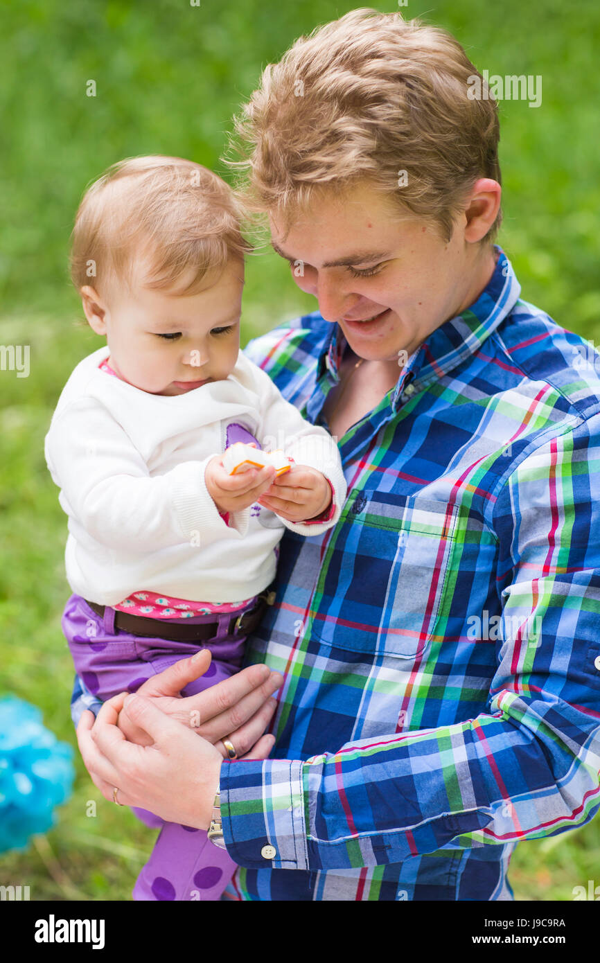 Portrait of happy father with daughter in summer park Stock Photo - Alamy