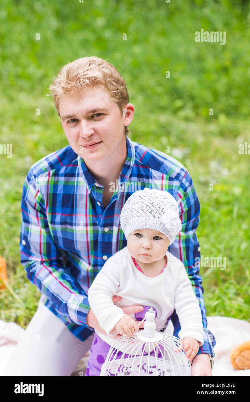 Happy father with baby daughter in summer park Stock Photo - Alamy
