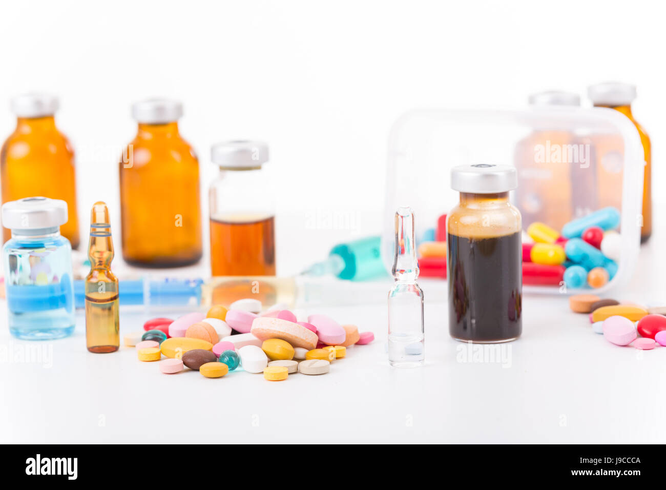 Different types of drugs on white background Stock Photo - Alamy