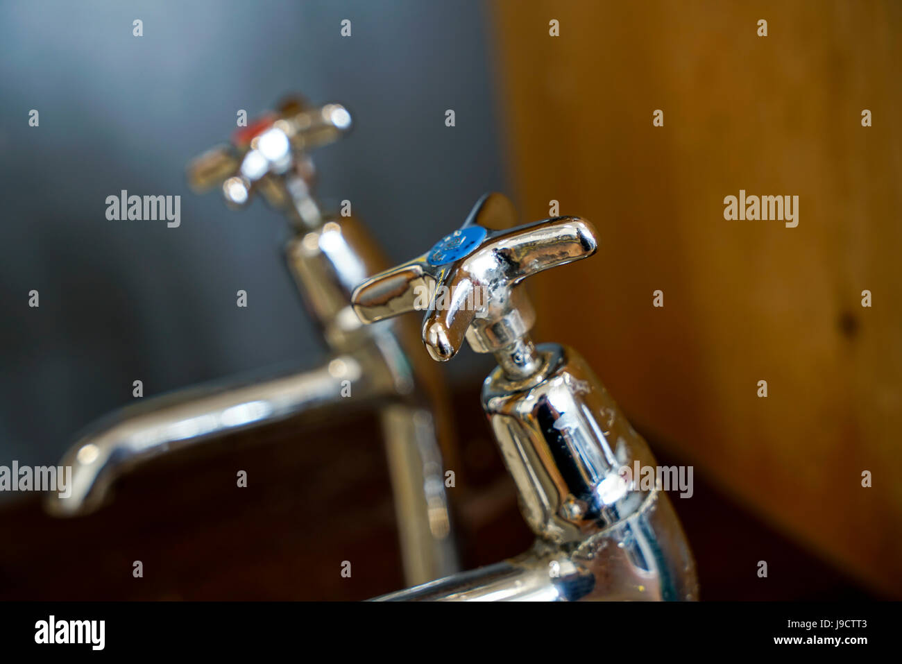 Chrome plate hot and cold water taps Stock Photo Alamy