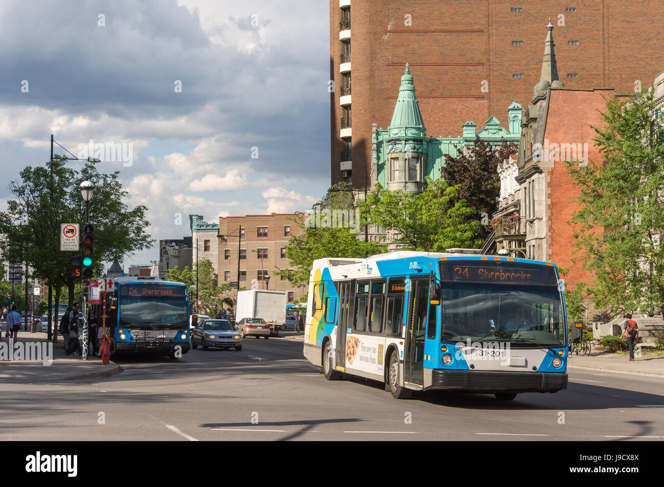 Montreal, Canada 31 may 20147 STM public transit bus on Sherbrooke