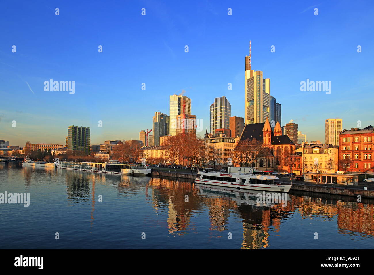 View across Main River towards the skyline of Frankfurt am Main, Hesse, Germany, Europe Stock Photo