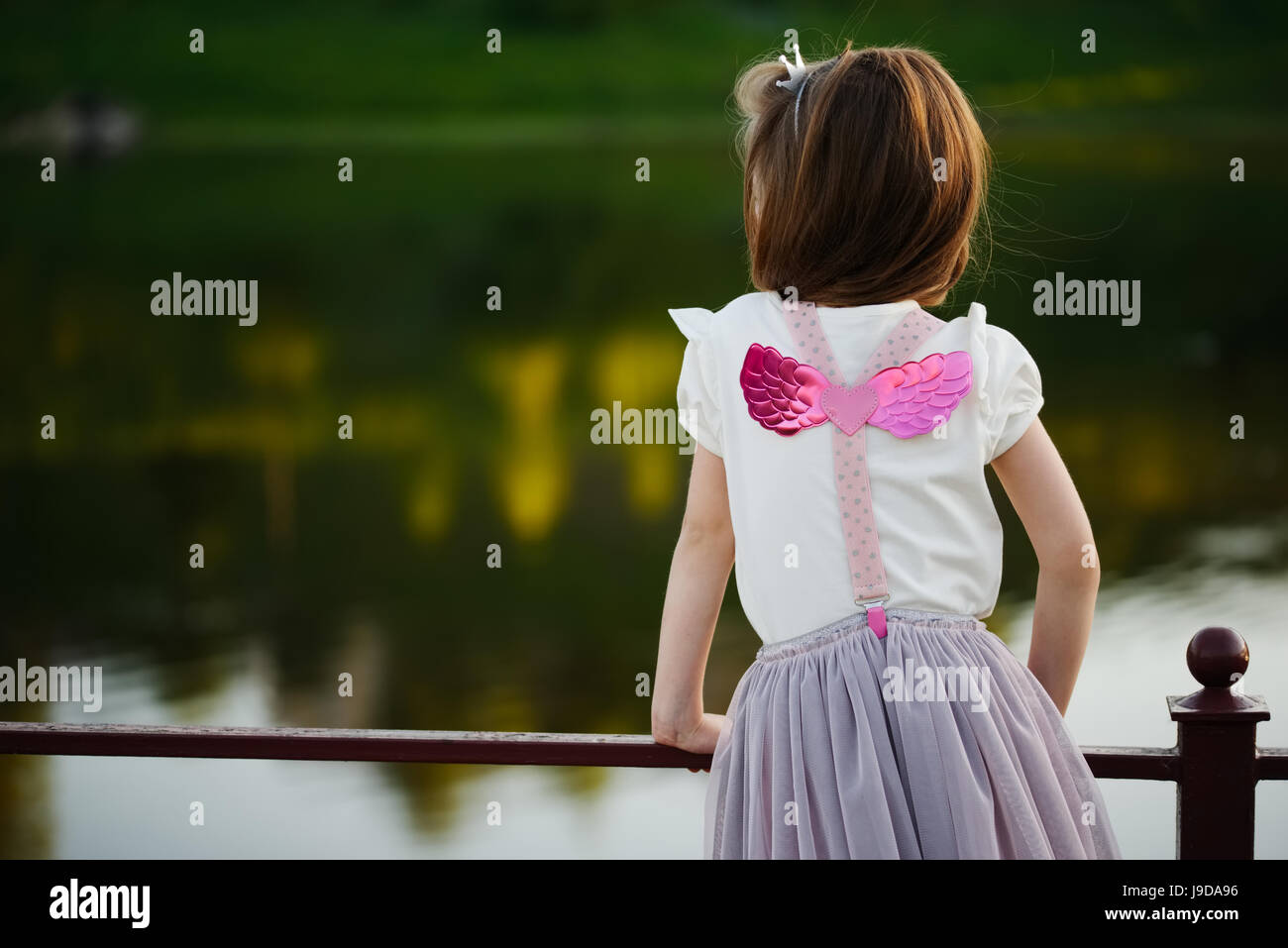 little girl with pink wings Stock Photo