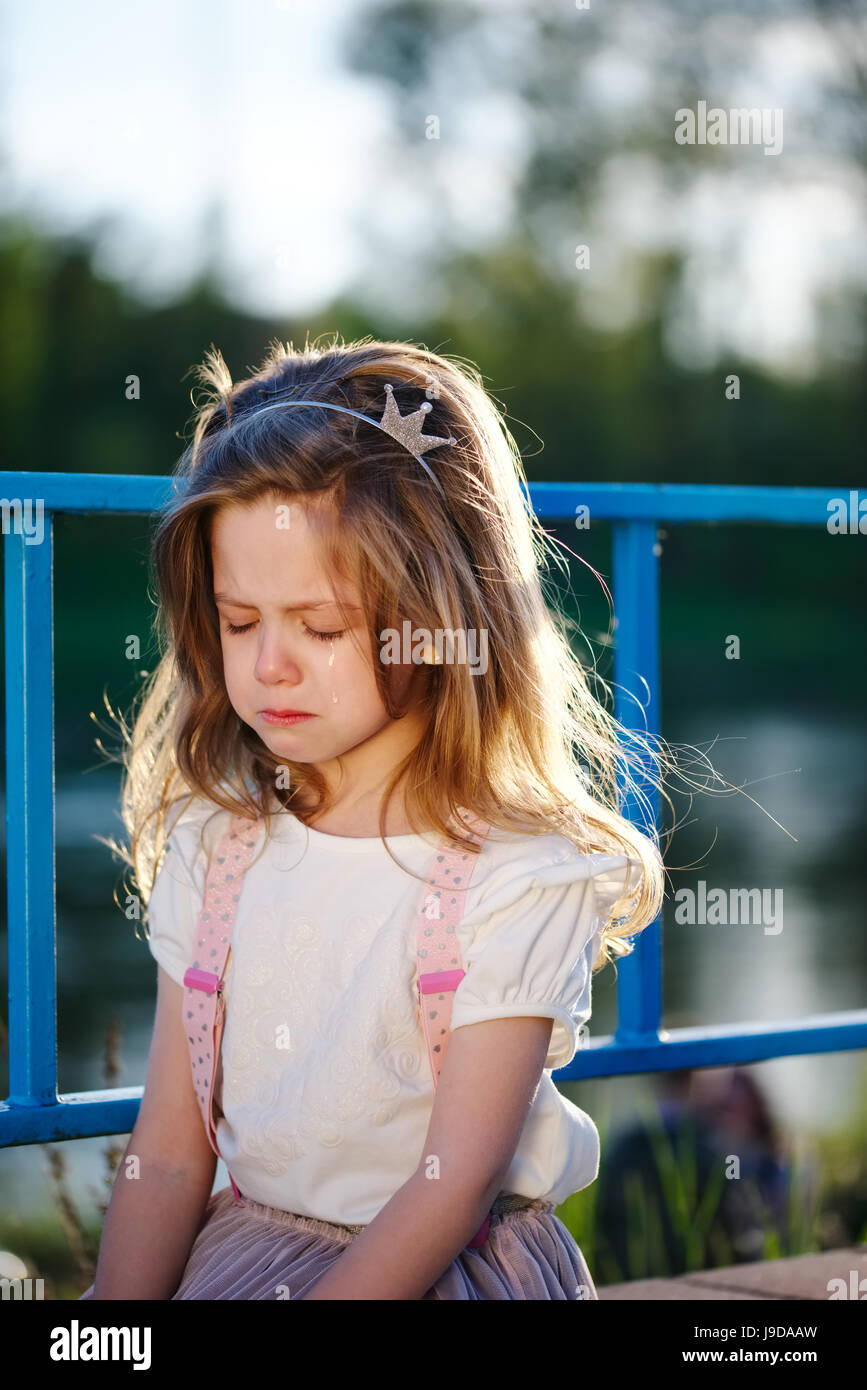 cute little crying girl Stock Photo - Alamy
