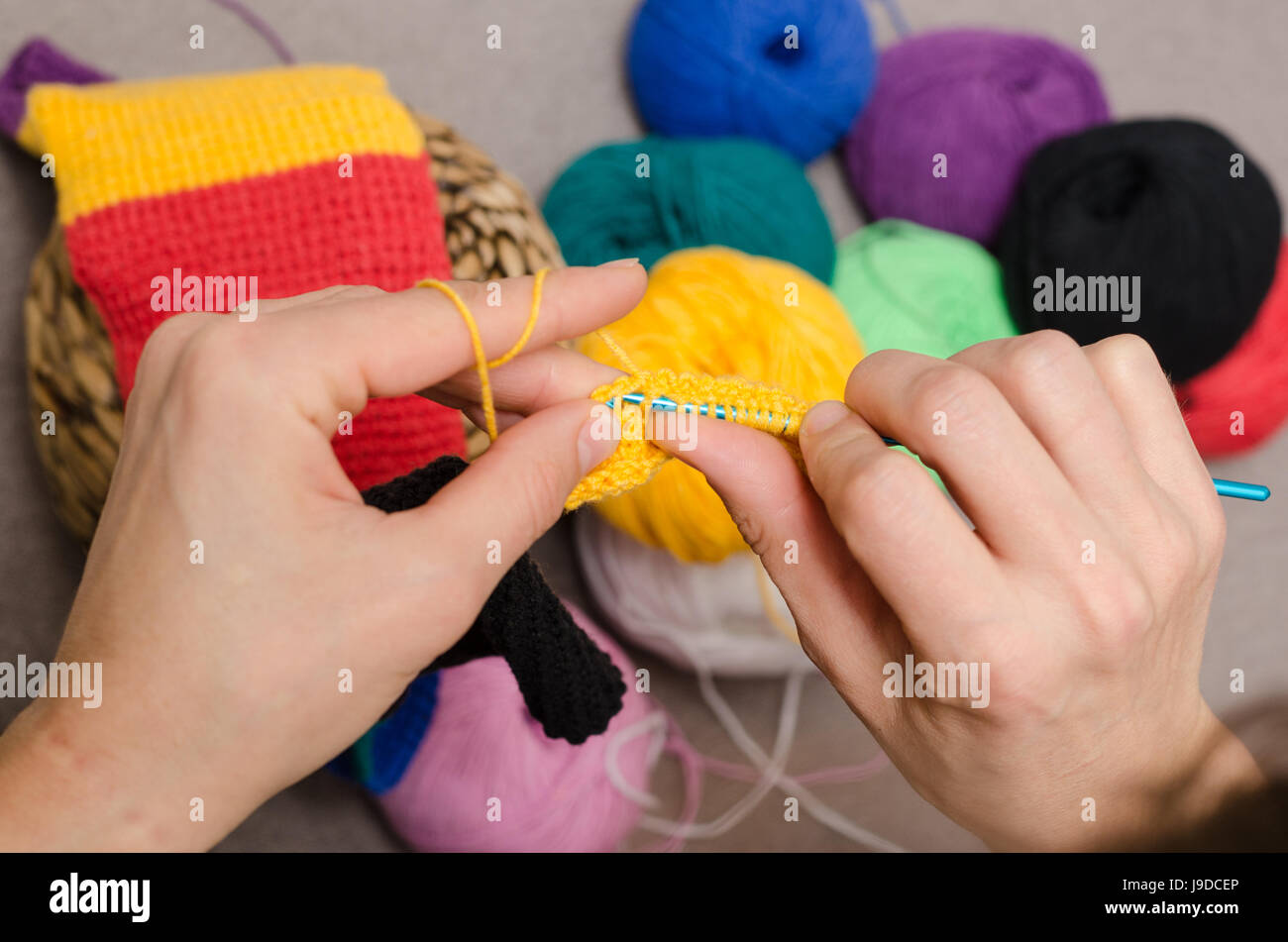 Close-up of hands knitting Stock Photo