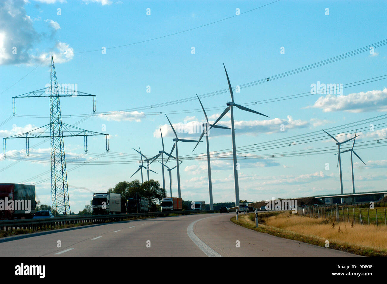 electricity pylons,wind farm,wind turbine,wind farm,wind,energy Stock Photo