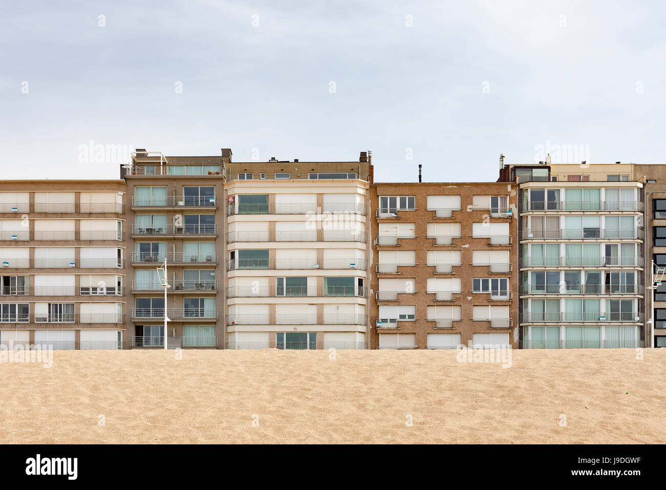 Koksijde, Belgian West Coast  - Appartment buildings on the promenade (Zeedijk) as seen from the beach Stock Photo