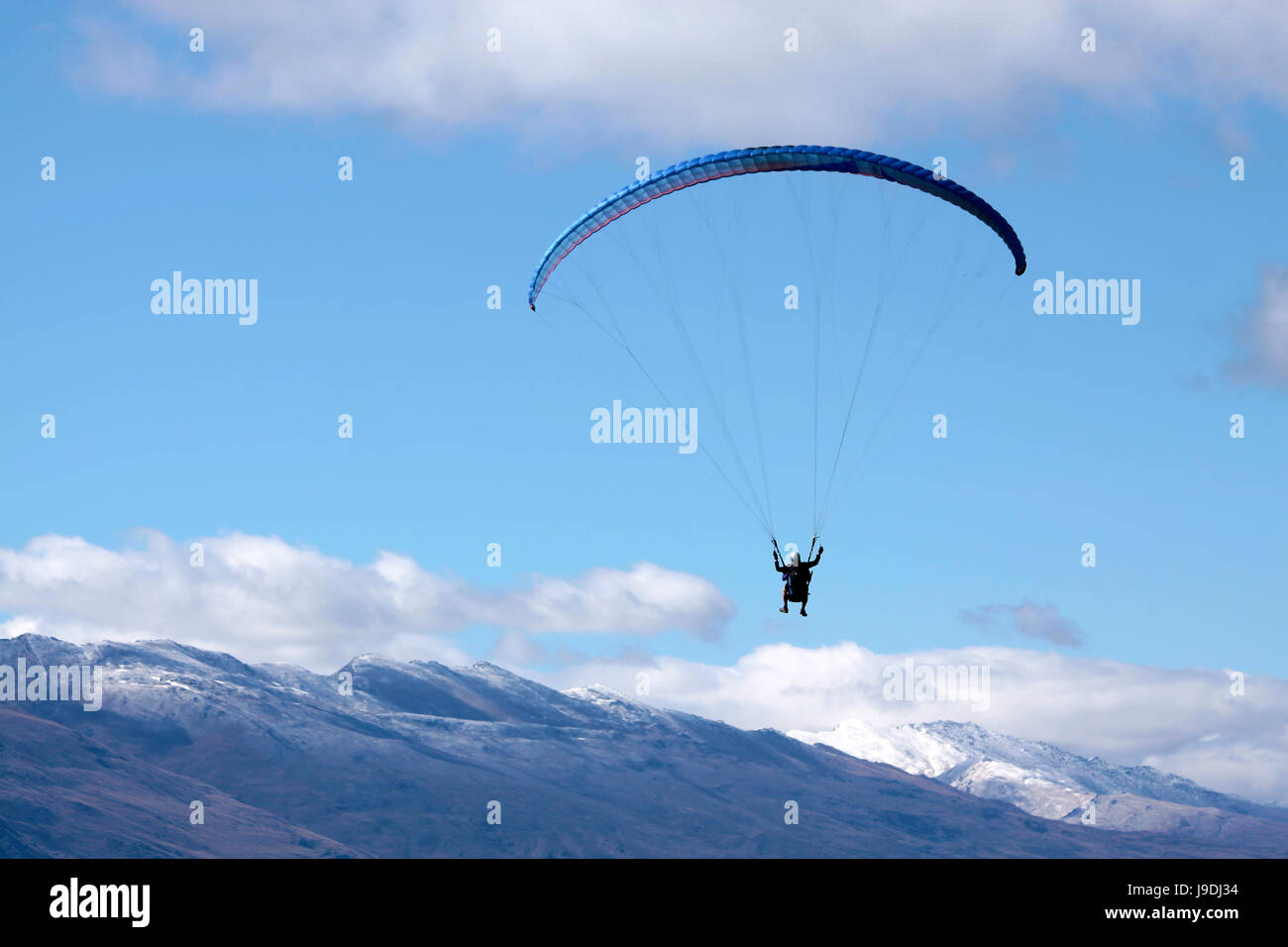 paraglider in the mountains Stock Photo