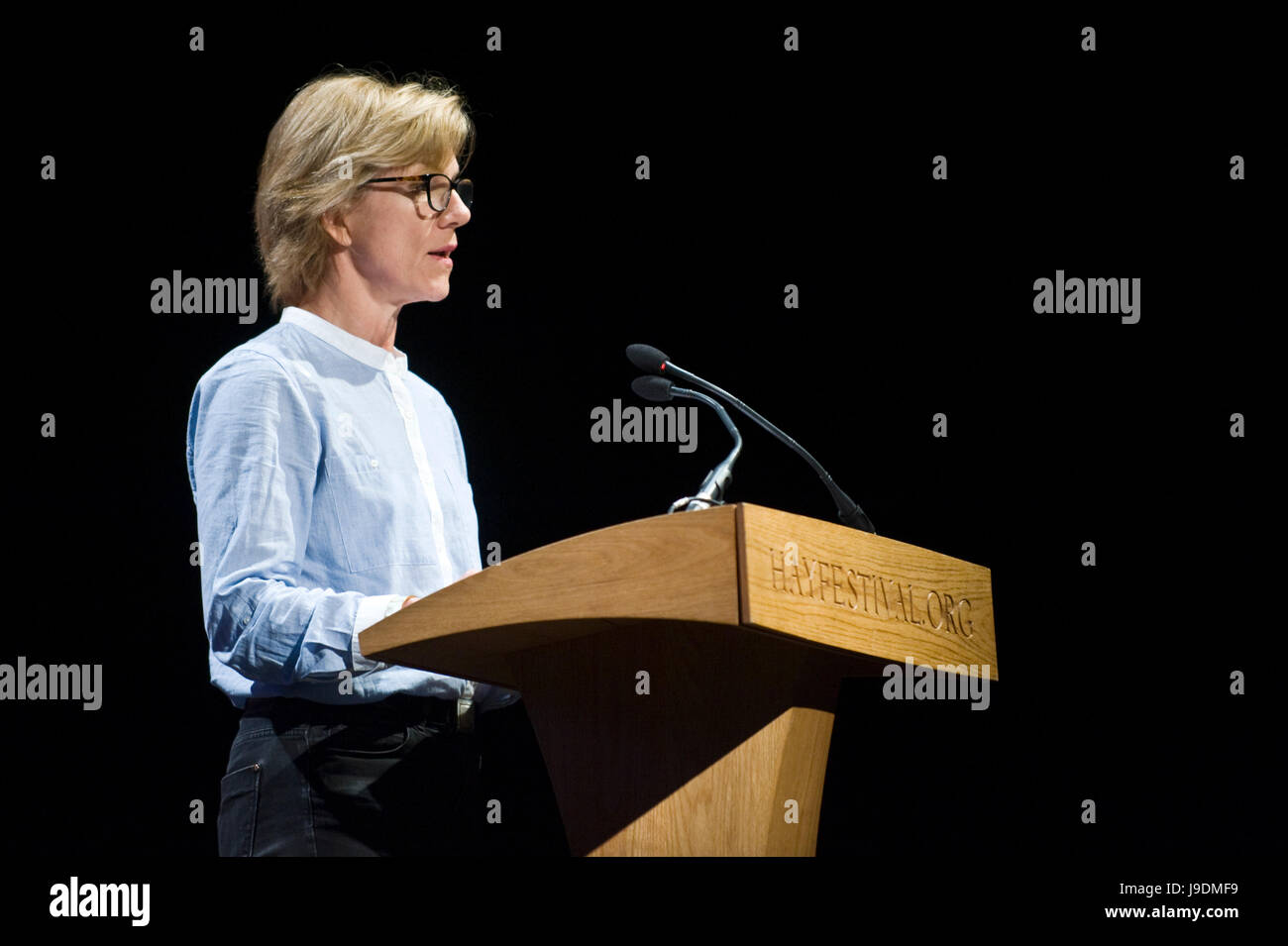 Juliet Stevenson reading from lectern at Letters Live event at Hay Festival 2017 Hay-on-Wye Powys Wales UK Stock Photo