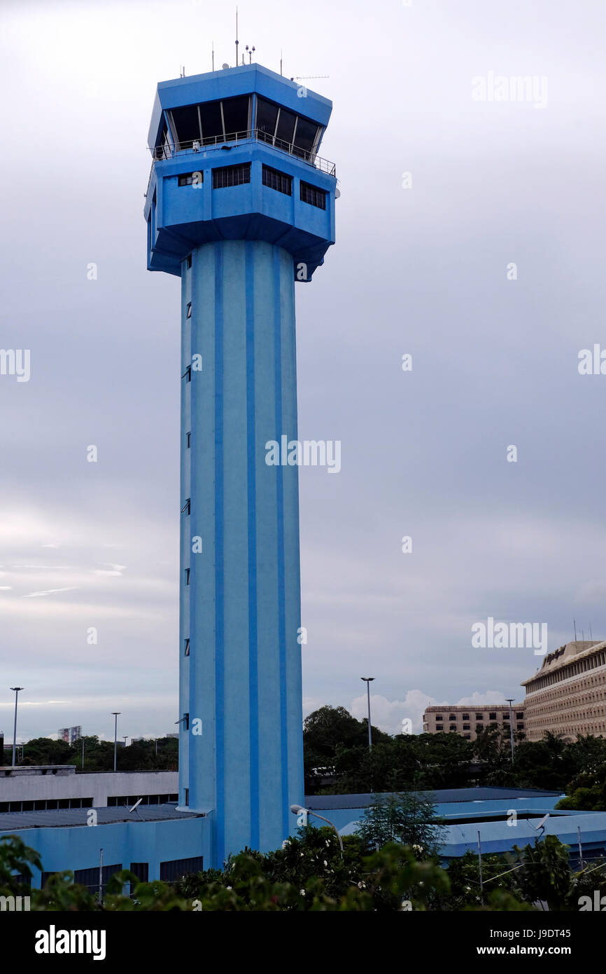 Air traffic control tower of the Ninoy Aquino International Airport or NAIA, also known as Manila International Airport in the Philippines Stock Photo