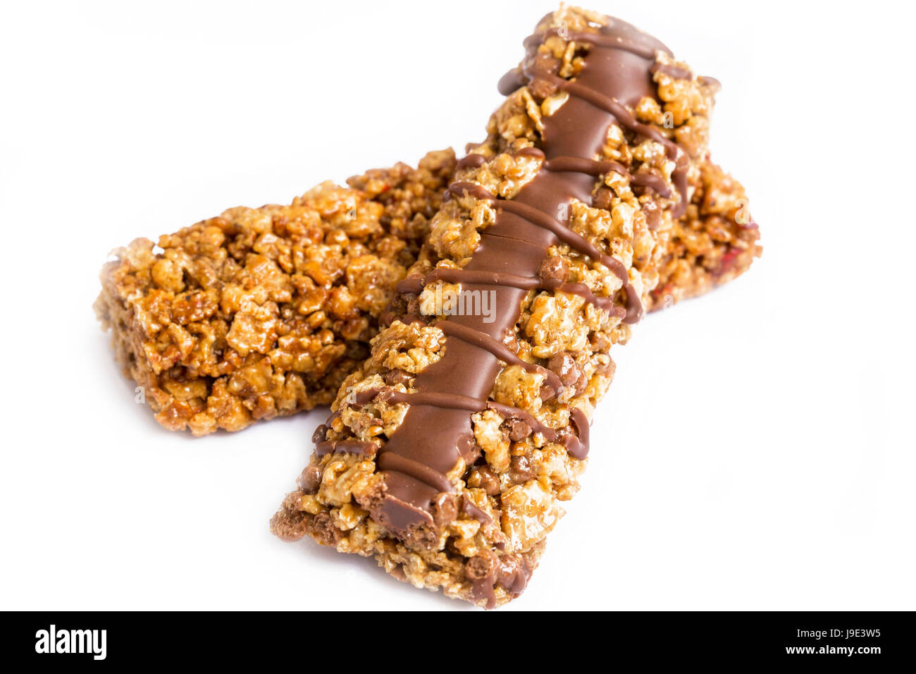 Granola or muesli bars with chocolate isolated on white Stock Photo