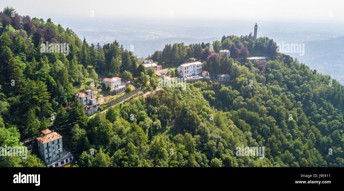 Aerial view of the Voltiano Lighthouse of Brunate and Como lake, trees and green. Lombardy, Italy. Dedicated to Alessandro Volta Stock Photo