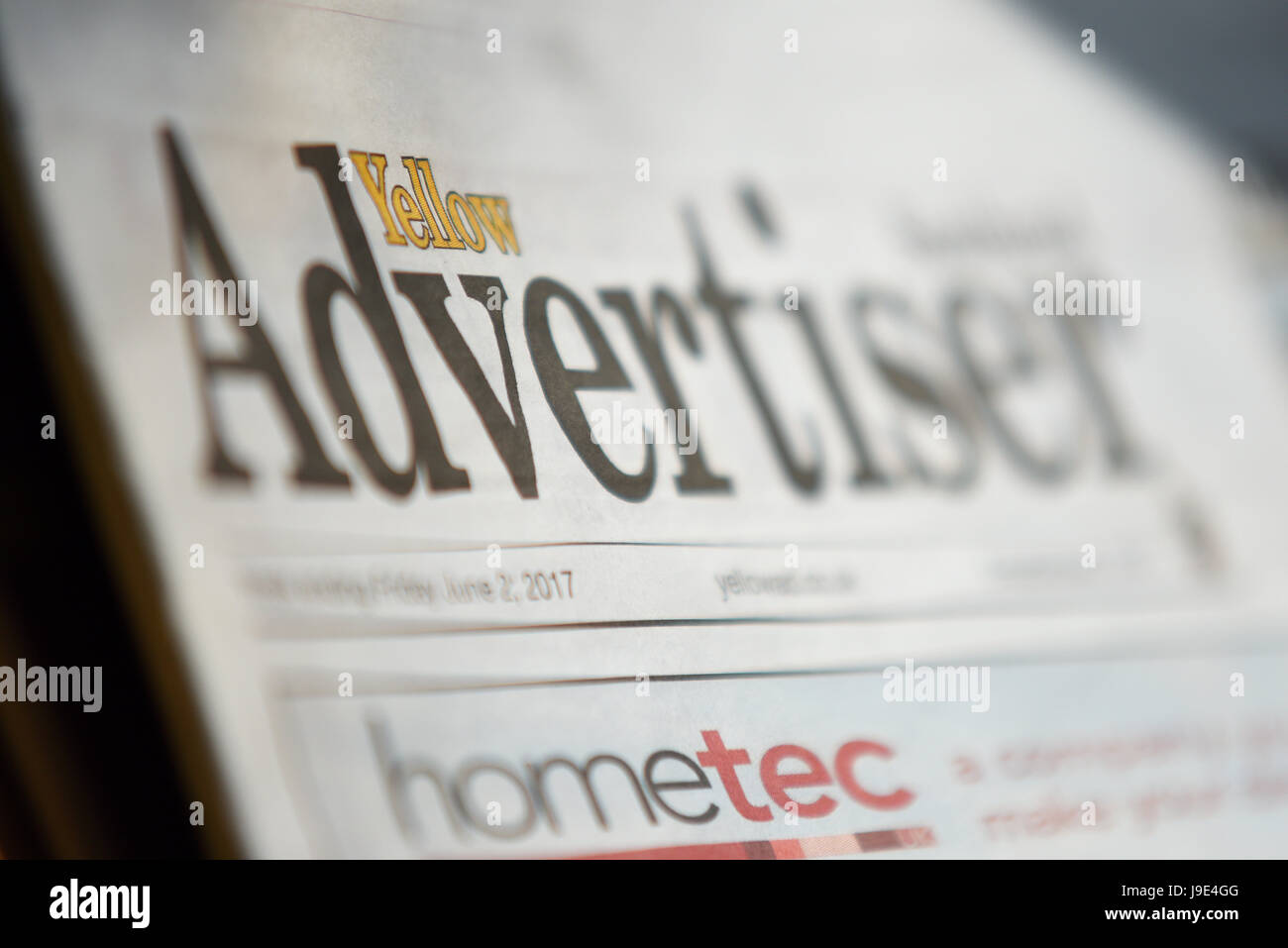 Yellow Advertiser newspaper title banner. Narrow focus to highlight