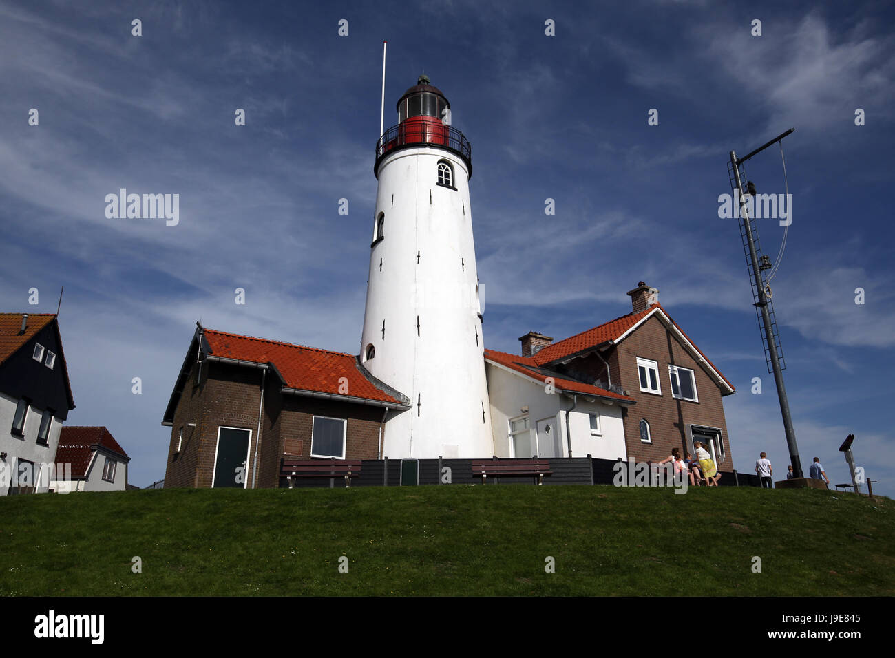 Urk Lighthouse is a lighthouse in Urk, the Netherlands, at the eastern banks of the IJsselmeer. Stock Photo