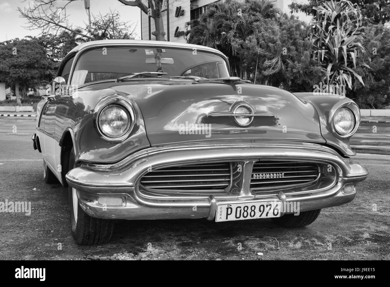 Trinidad, Cuba - January 22 ,2017: Old american car on the road Old Havana, Cuba.Thousands of these cars are still in use in Cuba and they have become Stock Photo