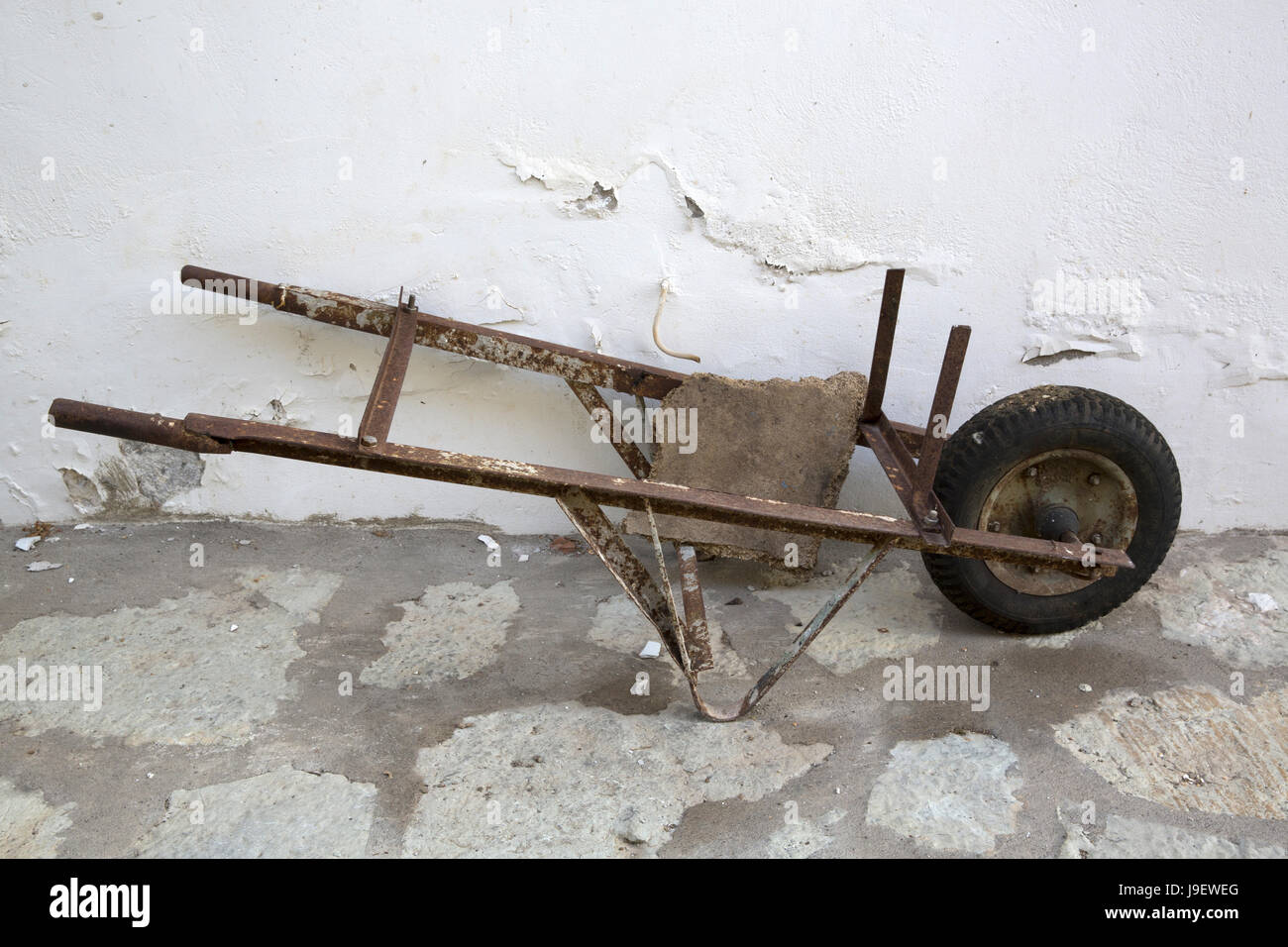 Brioken wheelbarrow, Vathy, Meganisi, Greece Stock Photo Alamy