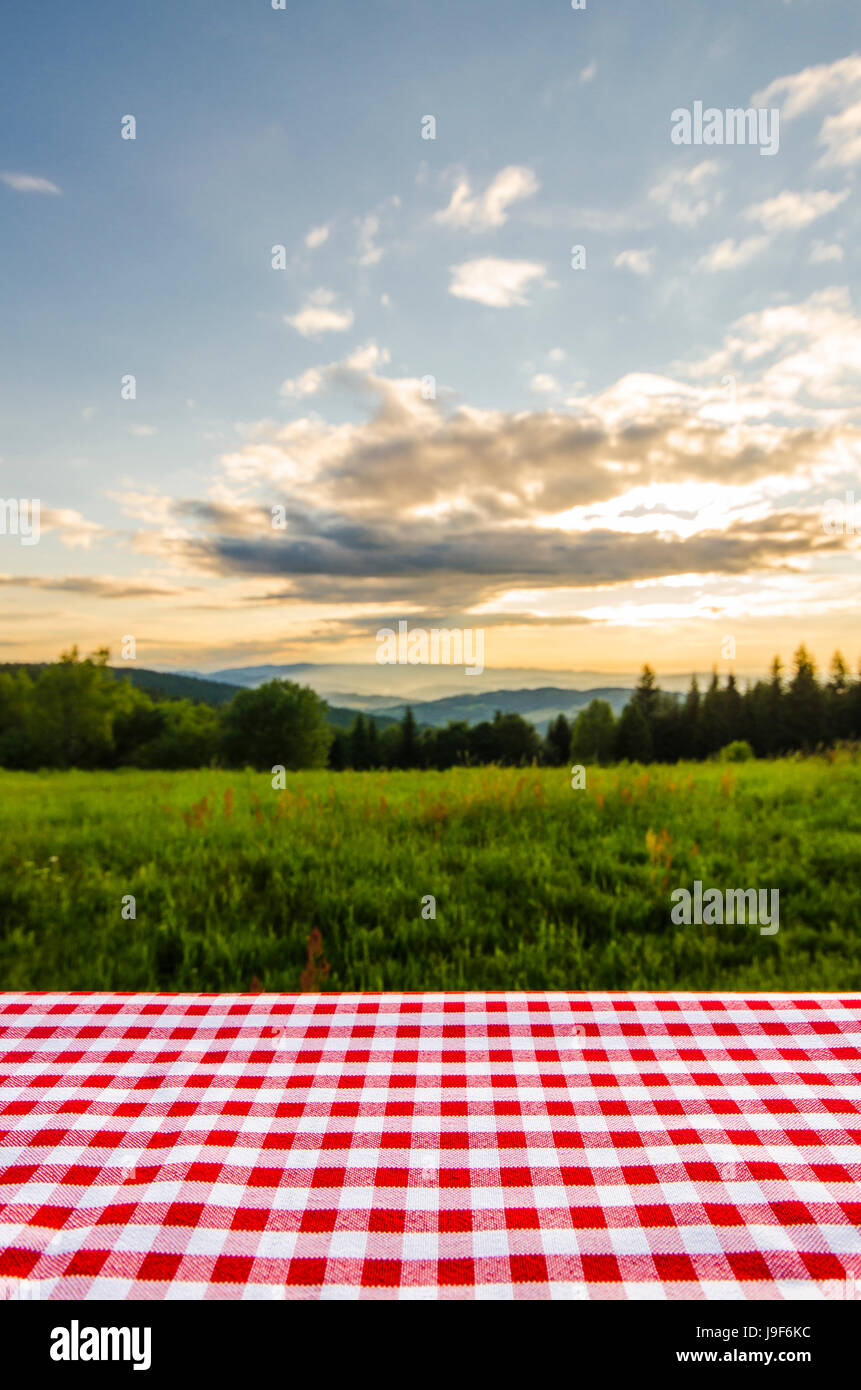 Empty table with landscape background Stock Photo - Alamy