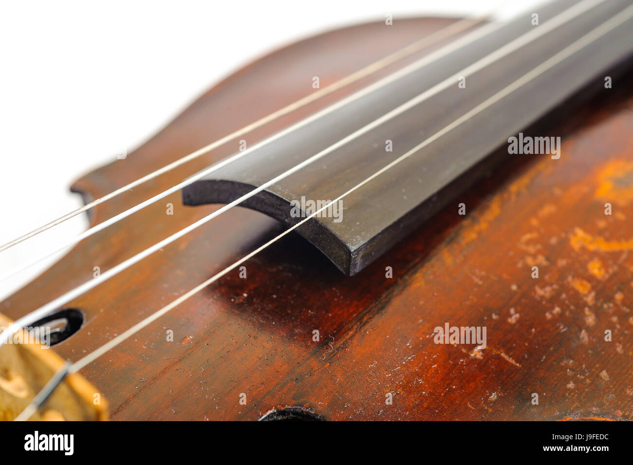 one violin image .old brown stringed wooden instrument close up view ...