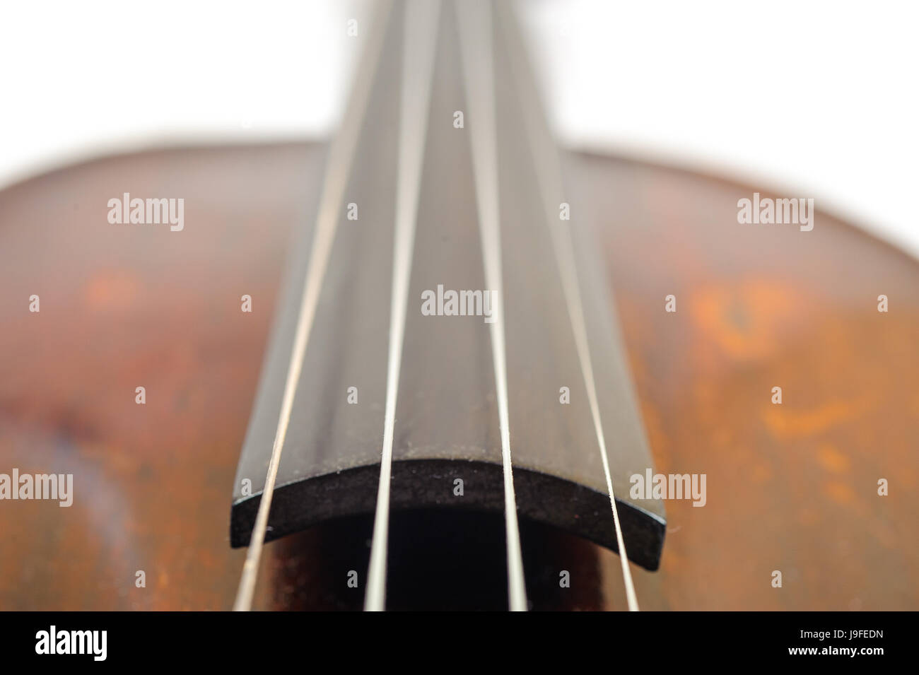 one violin image .old brown stringed wooden instrument close up view ...