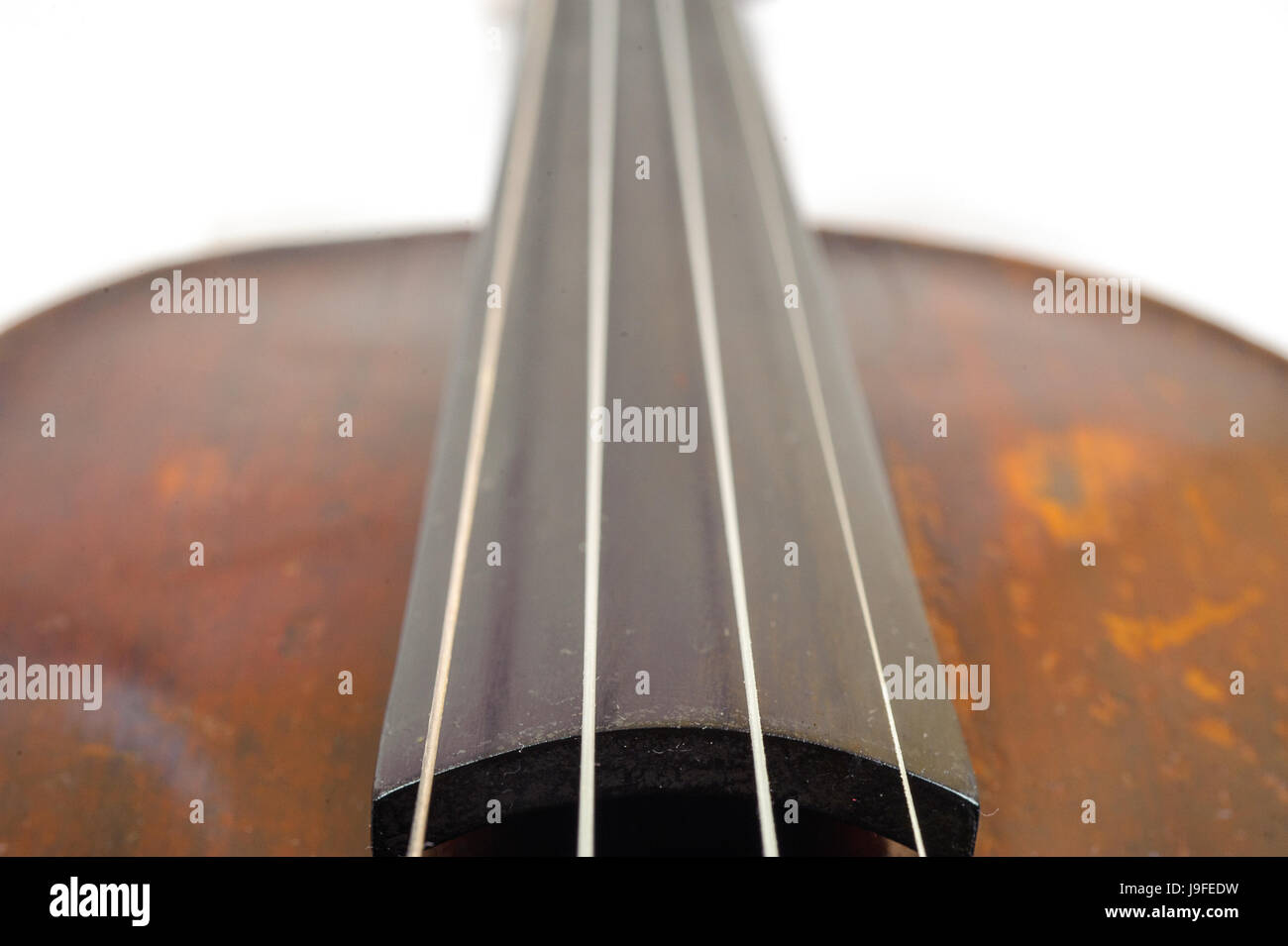 one violin image .old brown stringed wooden instrument close up view ...
