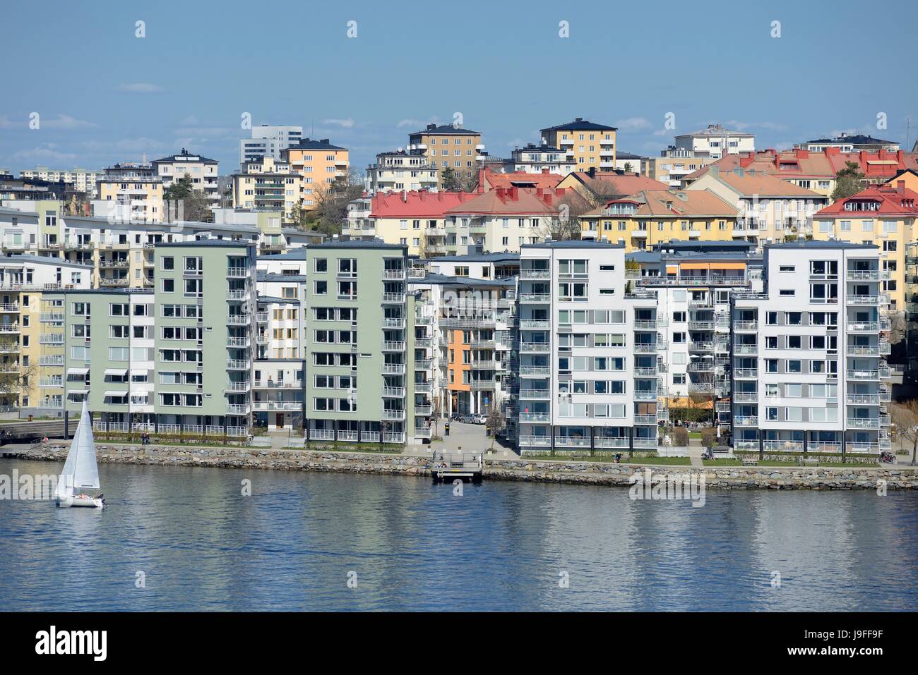 Waterfront apartment buildings Stock Photo